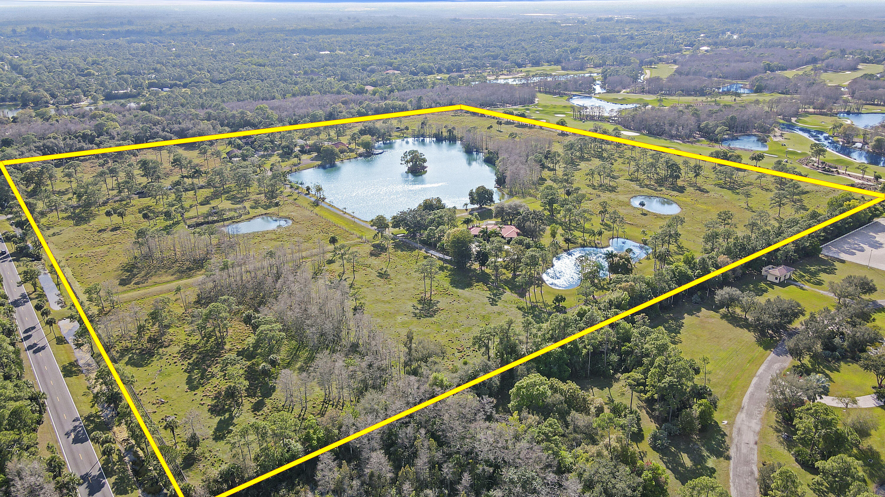 19900-addl Southeast Mack Dairy Road Jupiter, FL 33478 - Photo 1 of 50 50 acres - Stocked 5 acre lake