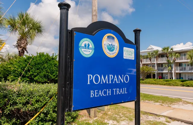 a view of a sign board with a road