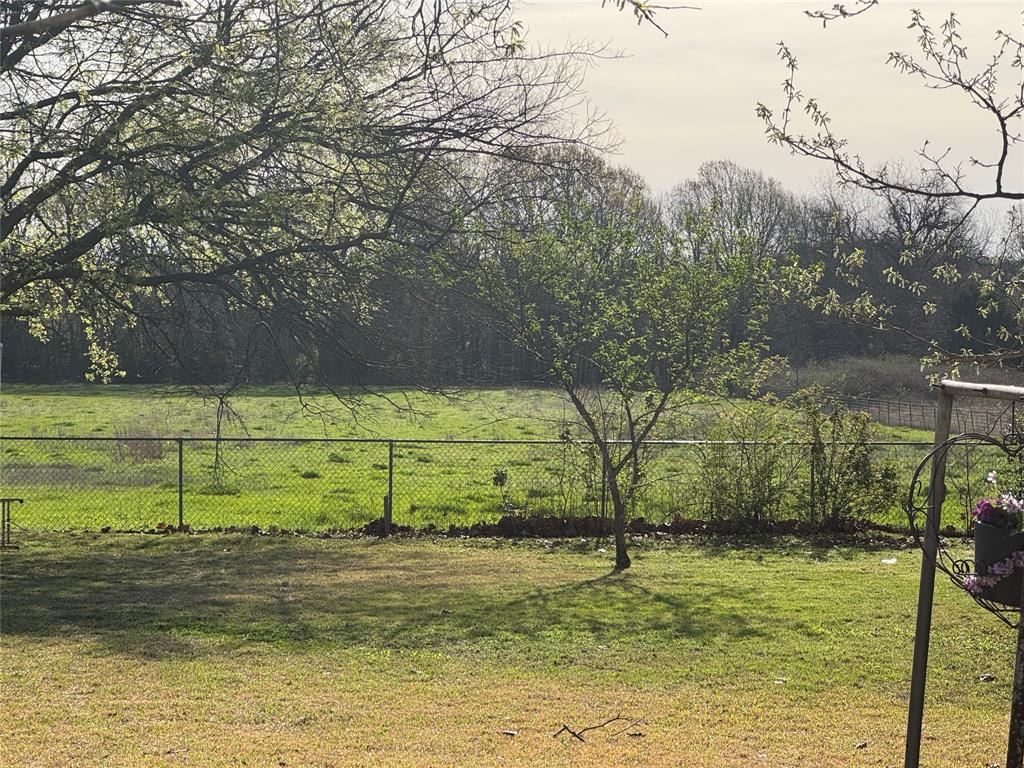 429 South Broadway Street Bells, TX 75414 - Photo 2 of 18 a view of a yard