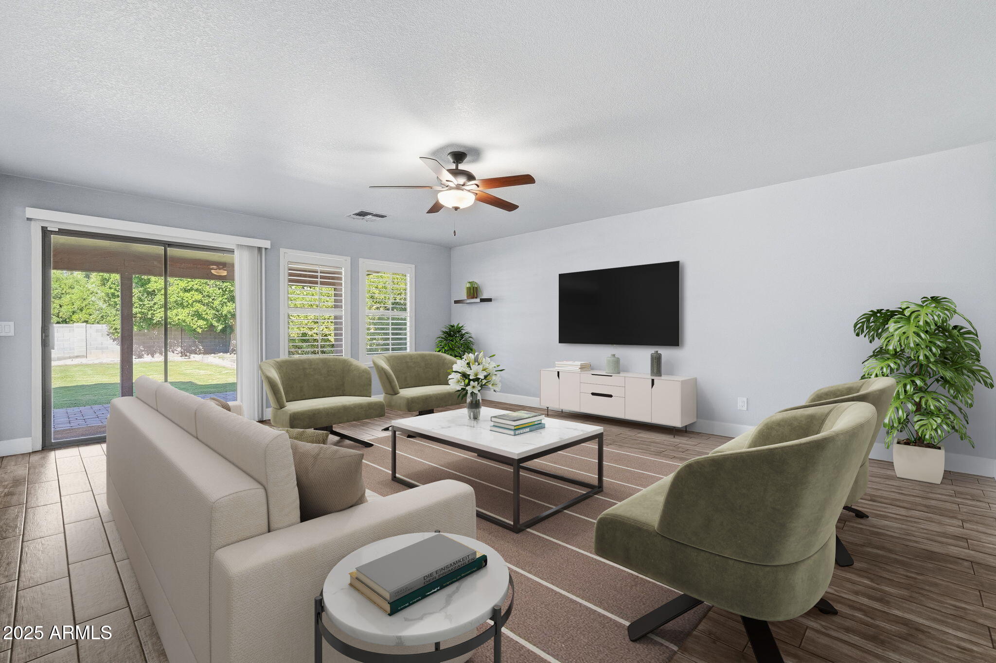 544 West Aviary Way Gilbert, AZ 85233 - Photo 11 of 45 a living room with furniture a flat screen tv and a large window