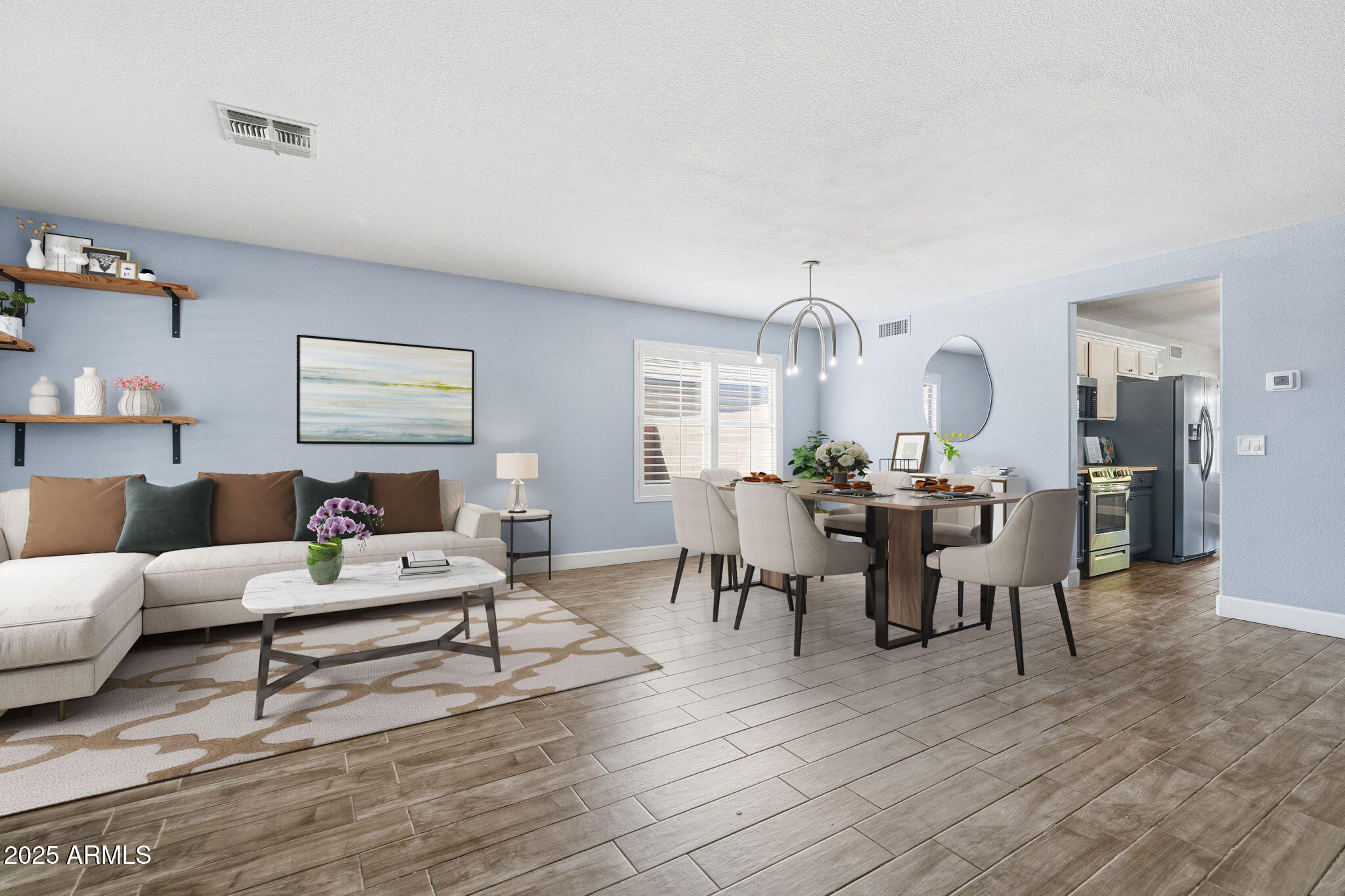 544 West Aviary Way Gilbert, AZ 85233 - Photo 18 of 45 a view of a dining room with furniture a rug and wooden floor