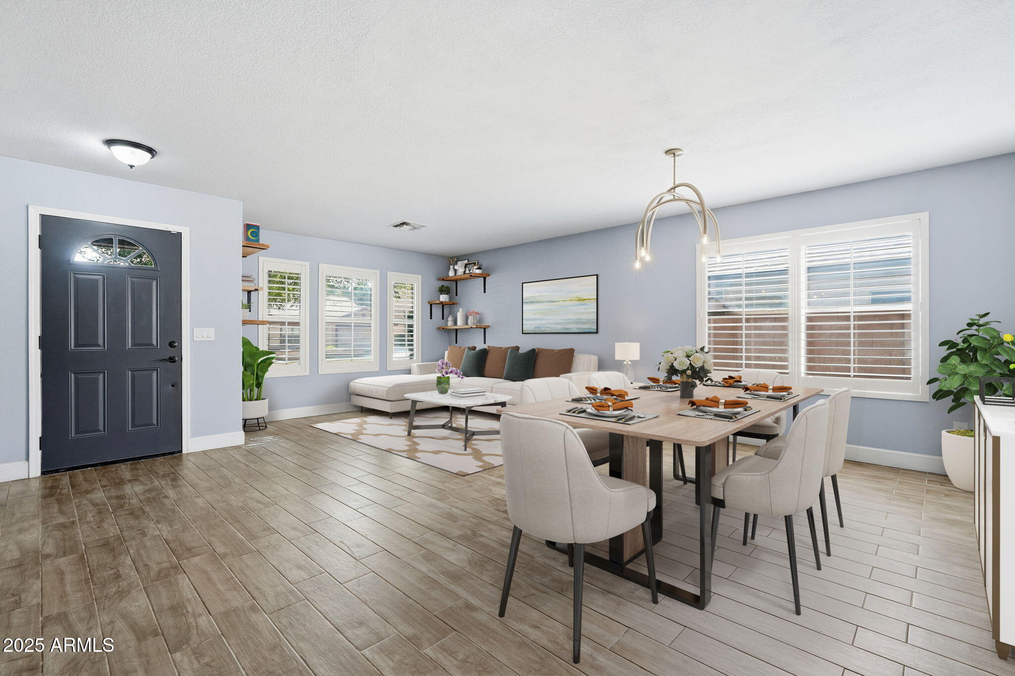 544 West Aviary Way Gilbert, AZ 85233 - Photo 19 of 45 a view of a dining room with furniture and wooden floor