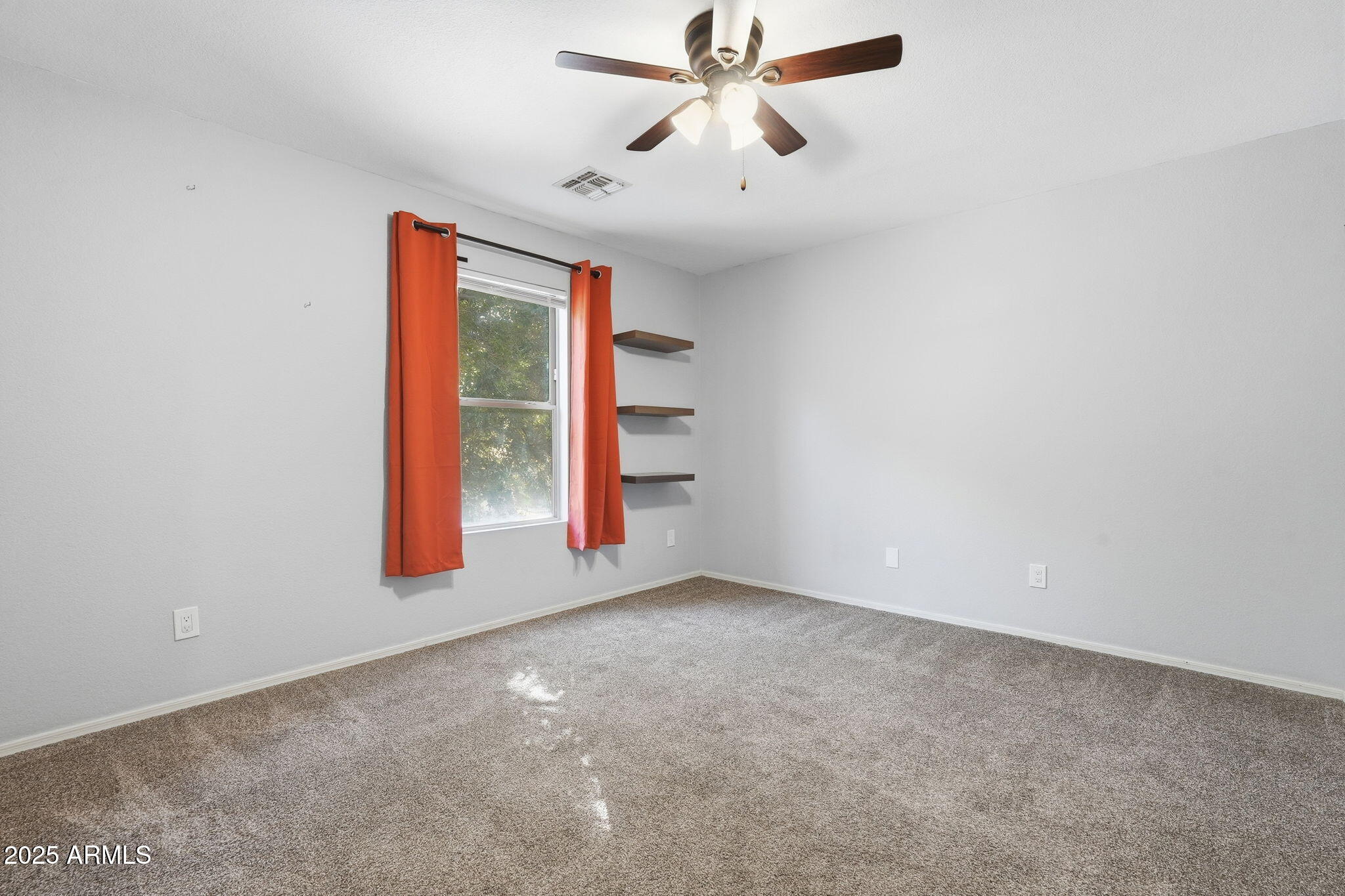 544 West Aviary Way Gilbert, AZ 85233 - Photo 22 of 45 an empty room with a empty space and a ceiling fan