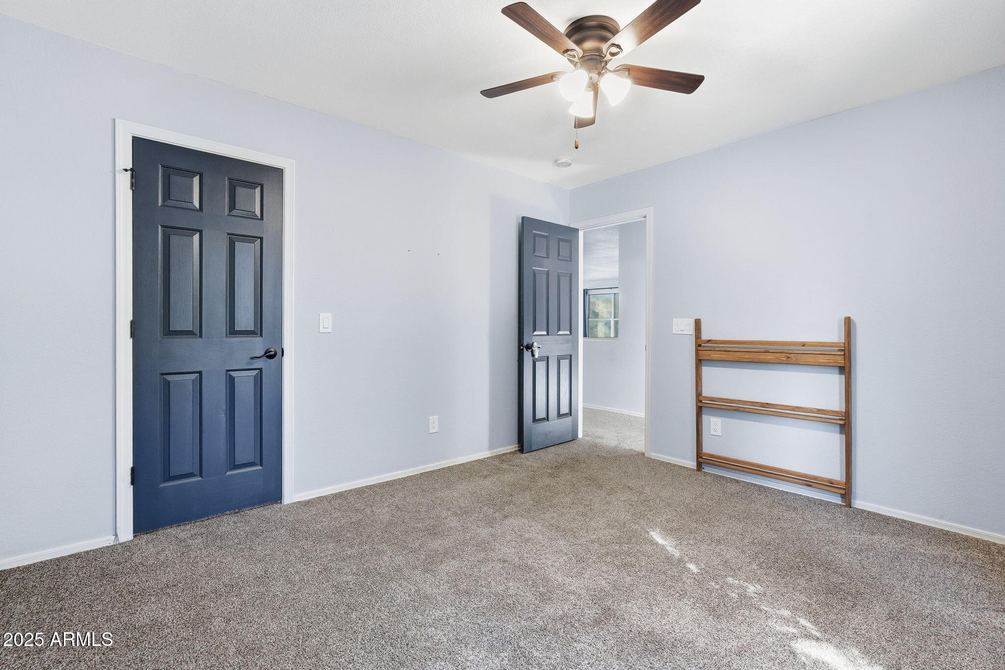 544 West Aviary Way Gilbert, AZ 85233 - Photo 23 of 45 a view of an empty room with a ceiling fan