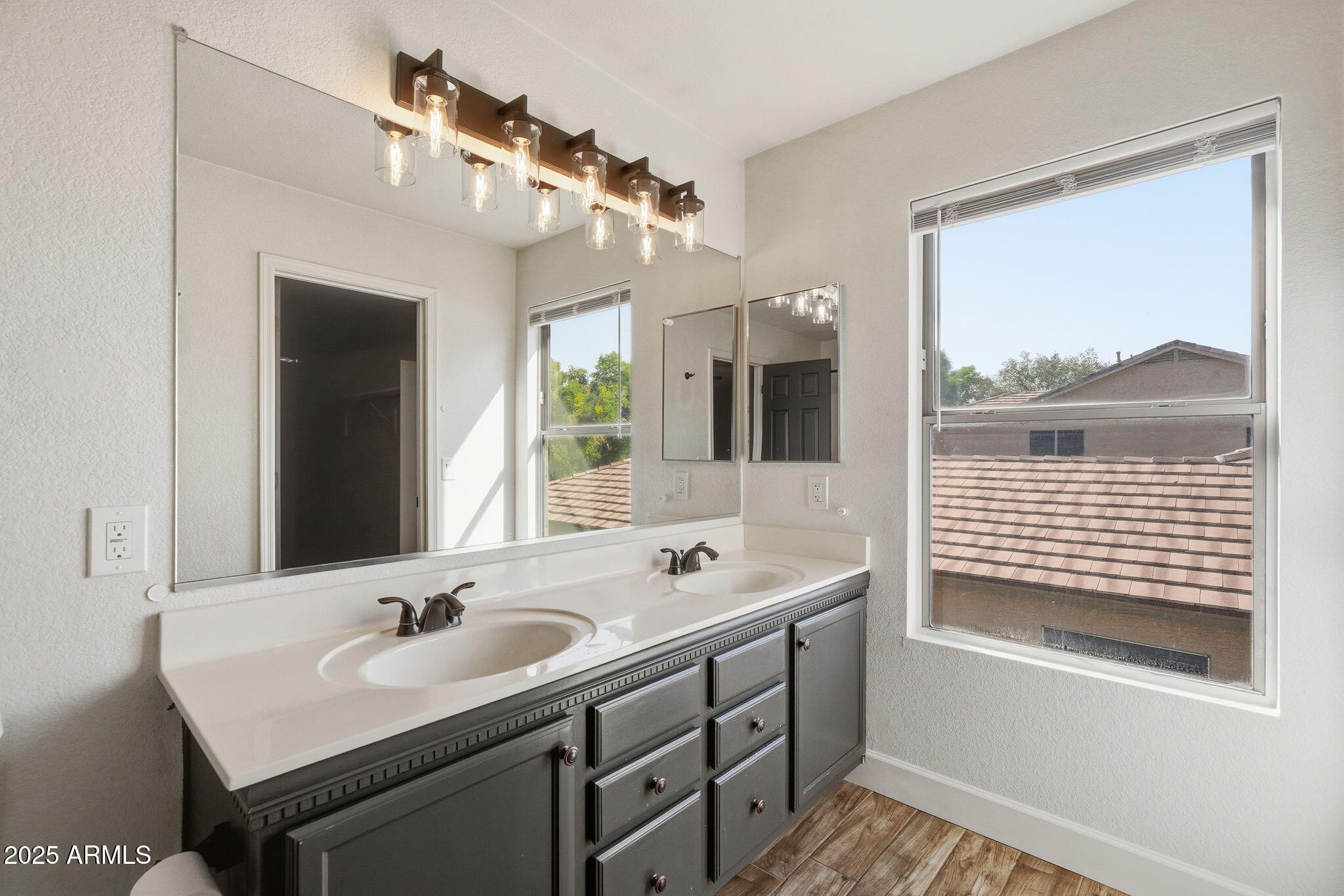 544 West Aviary Way Gilbert, AZ 85233 - Photo 29 of 45 a bathroom with a sink and a mirror