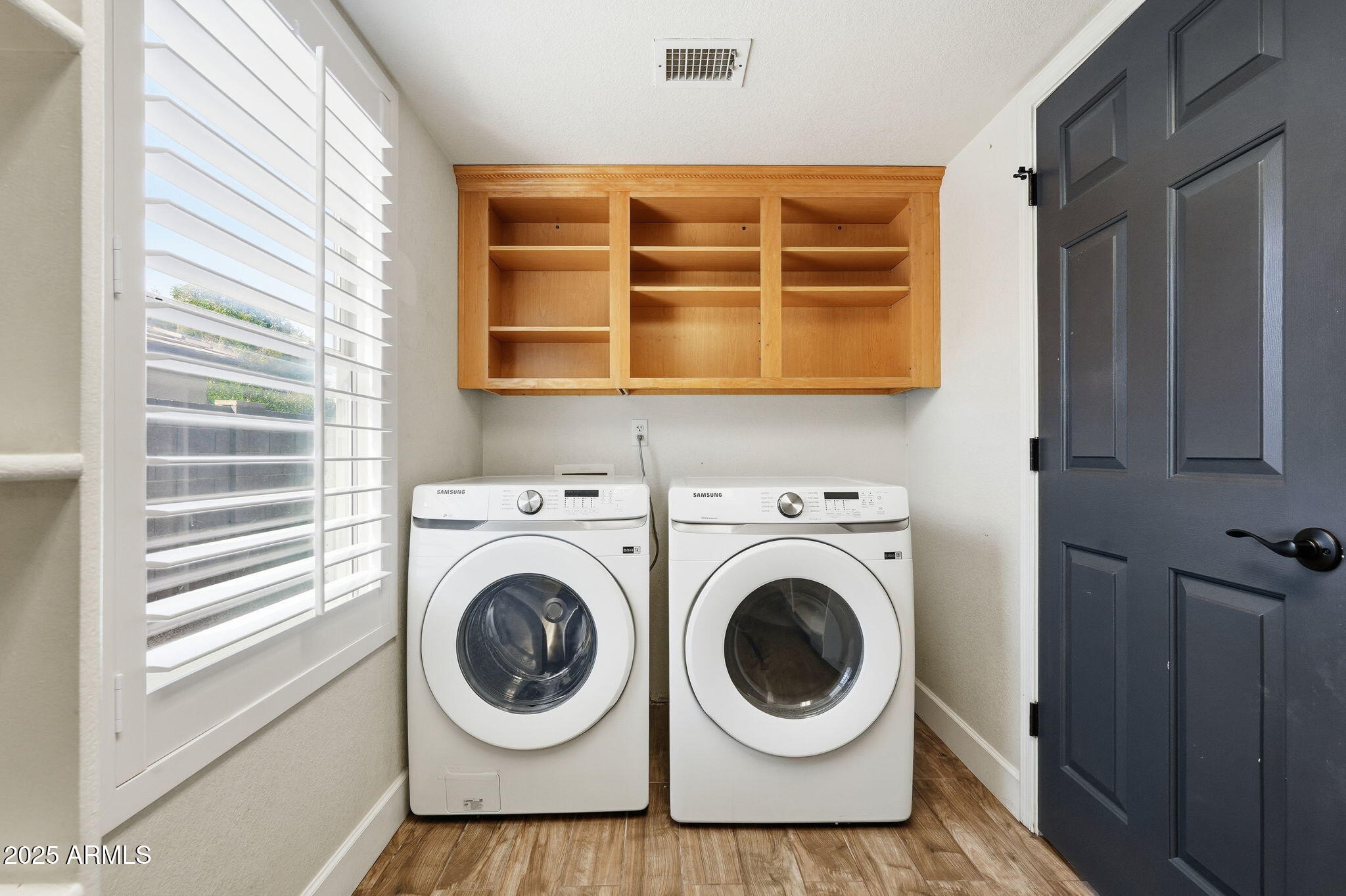 544 West Aviary Way Gilbert, AZ 85233 - Photo 32 of 45 a view of washer and dryer in a utility room