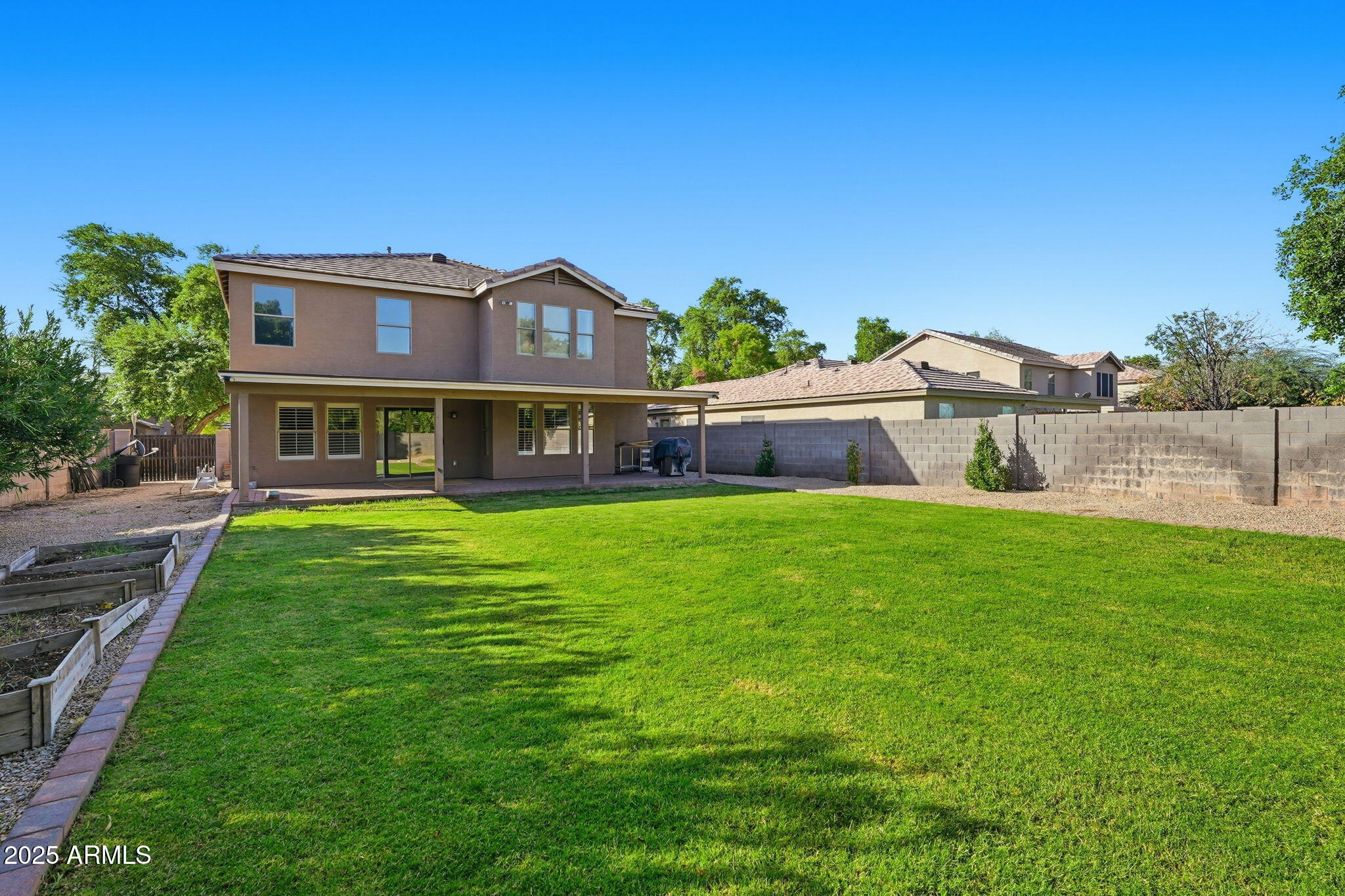 544 West Aviary Way Gilbert, AZ 85233 - Photo 37 of 45 a front view of a house with a yard