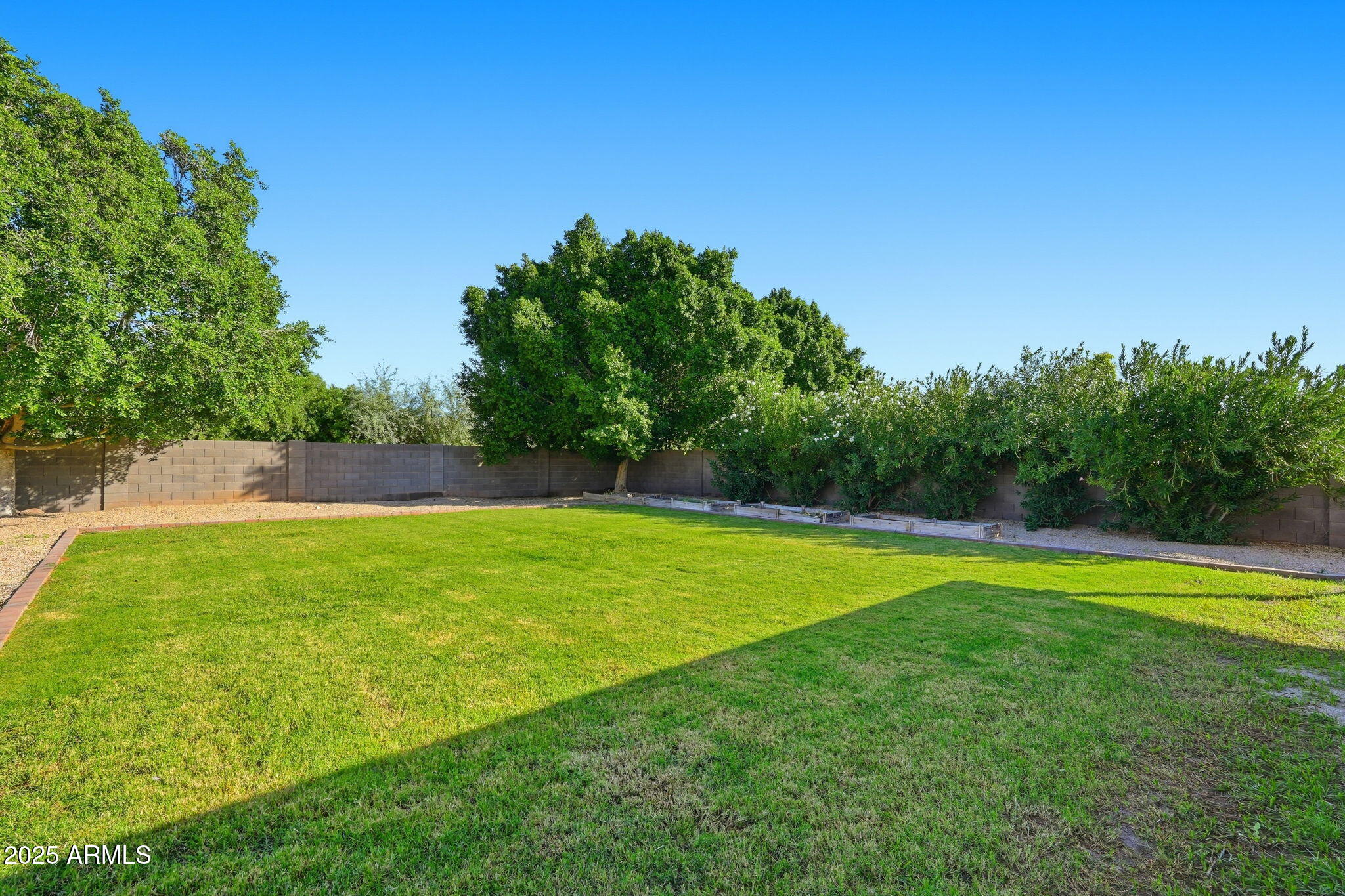 544 West Aviary Way Gilbert, AZ 85233 - Photo 38 of 45 a view of a swimming pool with a yard