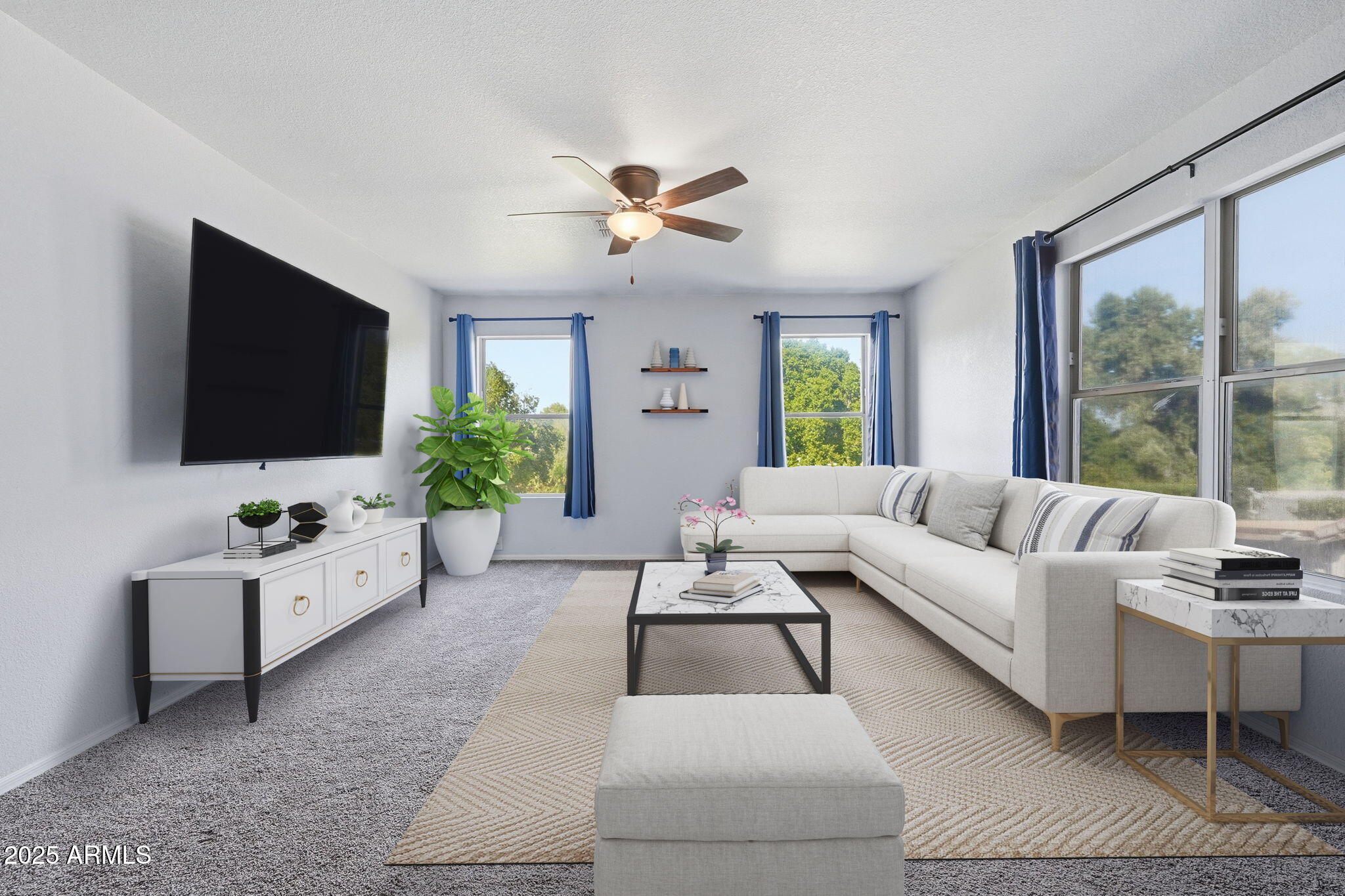 544 West Aviary Way Gilbert, AZ 85233 - Photo 5 of 45 a living room with furniture a flat screen tv and a large window
