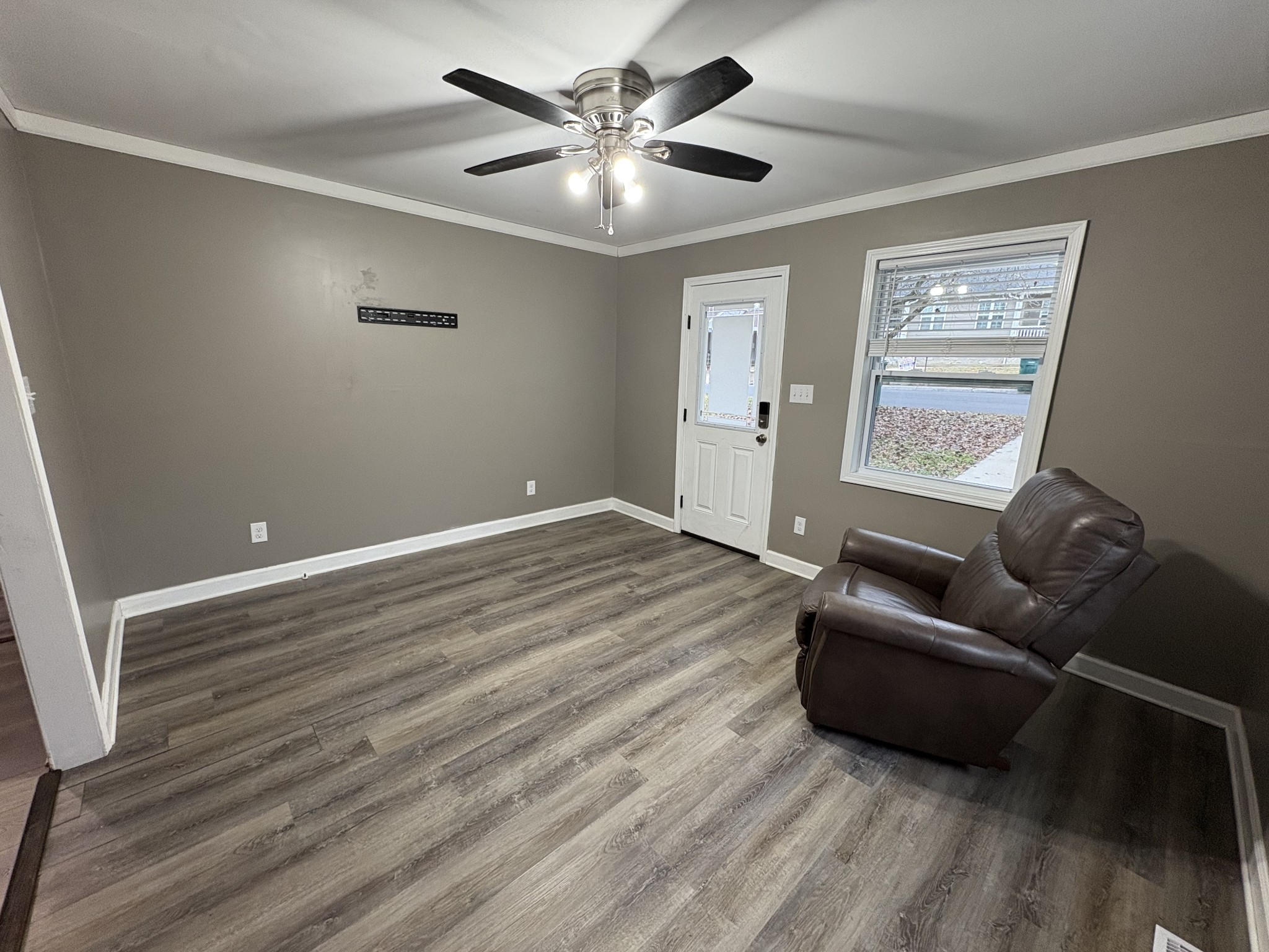 134 Elm Street Pulaski, TN 38478 - Photo 19 of 34 a living room with furniture and a large window