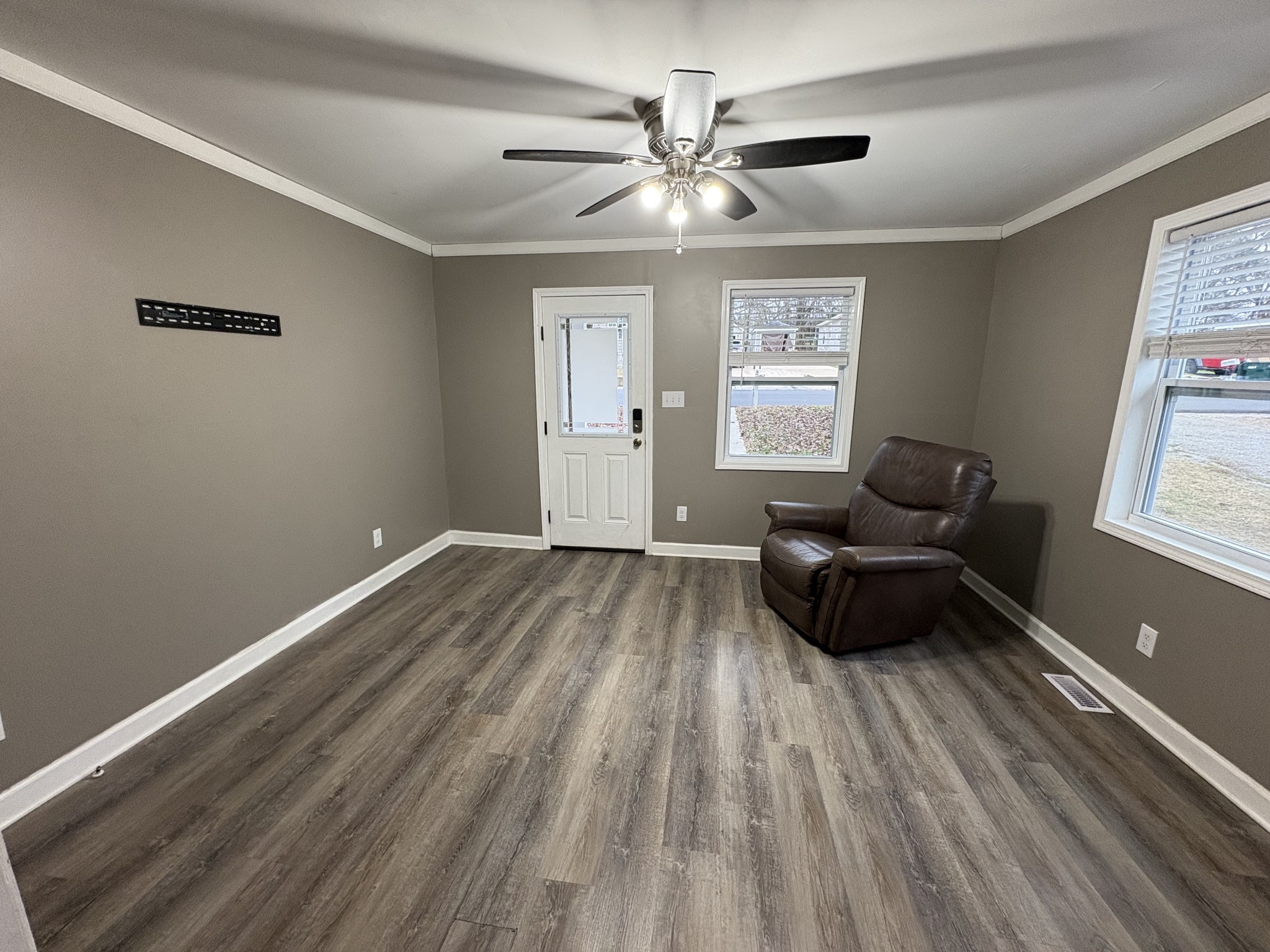 134 Elm Street Pulaski, TN 38478 - Photo 20 of 34 a living room with furniture and a large window