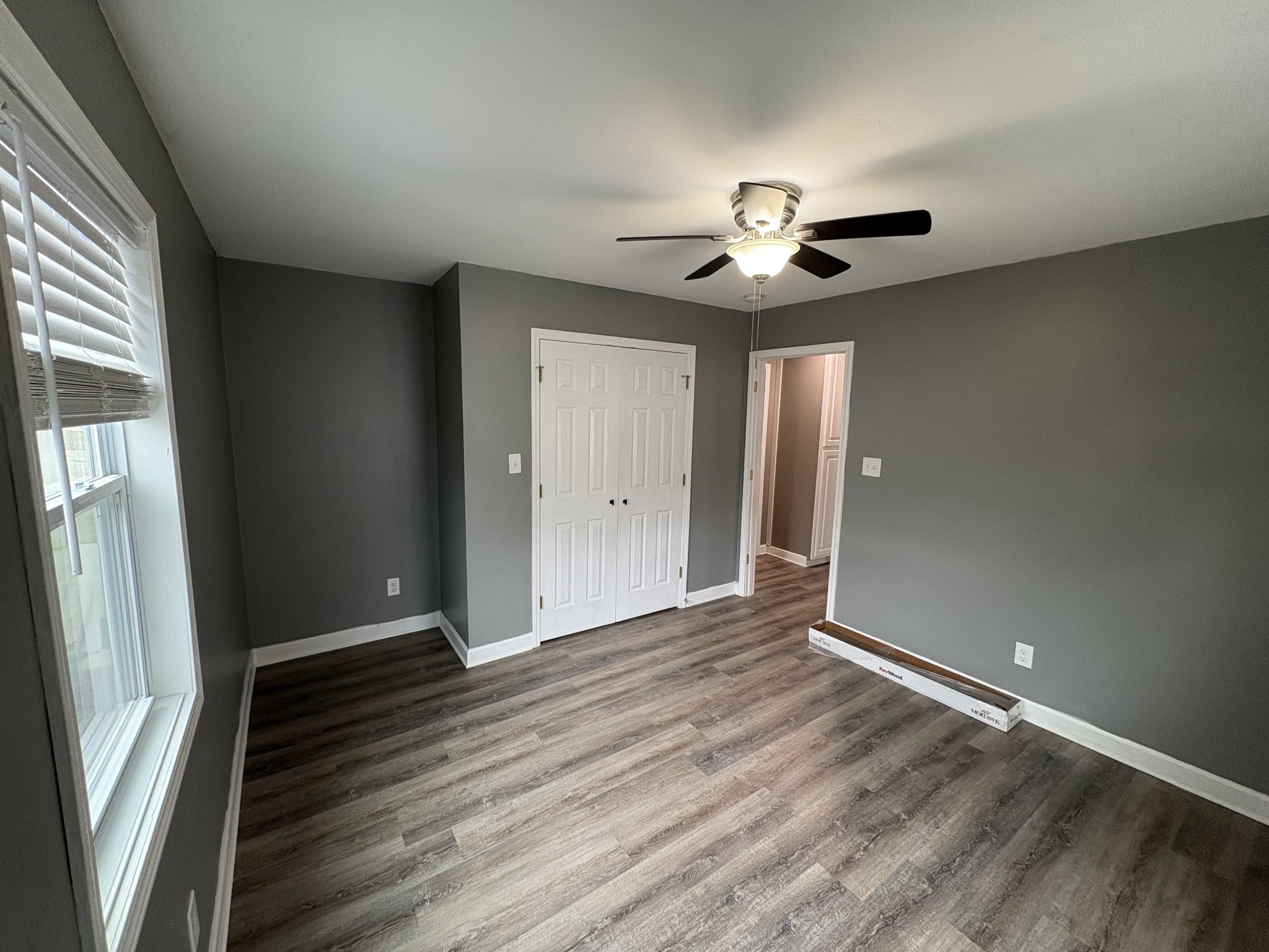 134 Elm Street Pulaski, TN 38478 - Photo 25 of 34 wooden floor in an empty room with a window