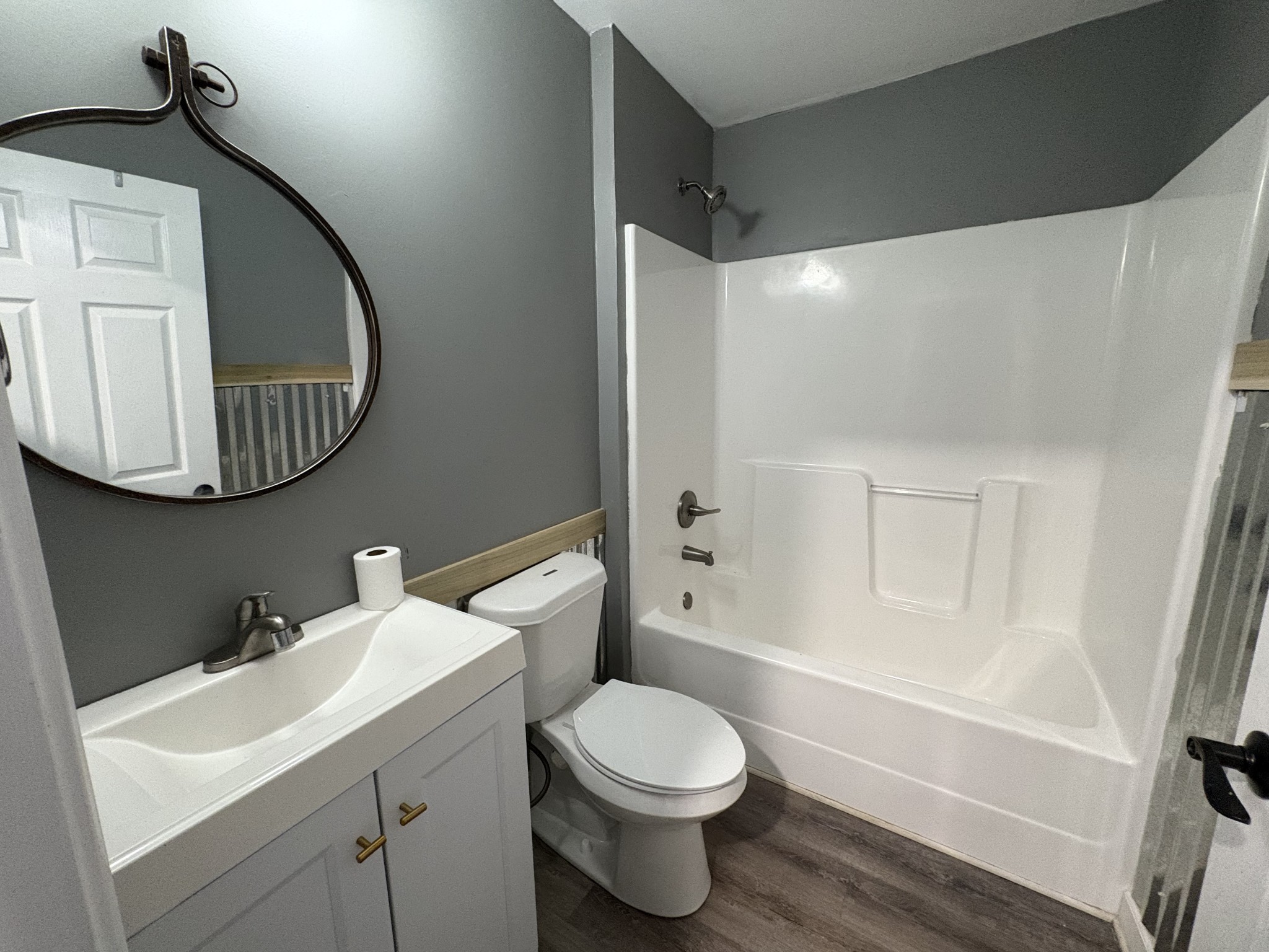 134 Elm Street Pulaski, TN 38478 - Photo 27 of 34 a bathroom with a toilet a sink and bathtub