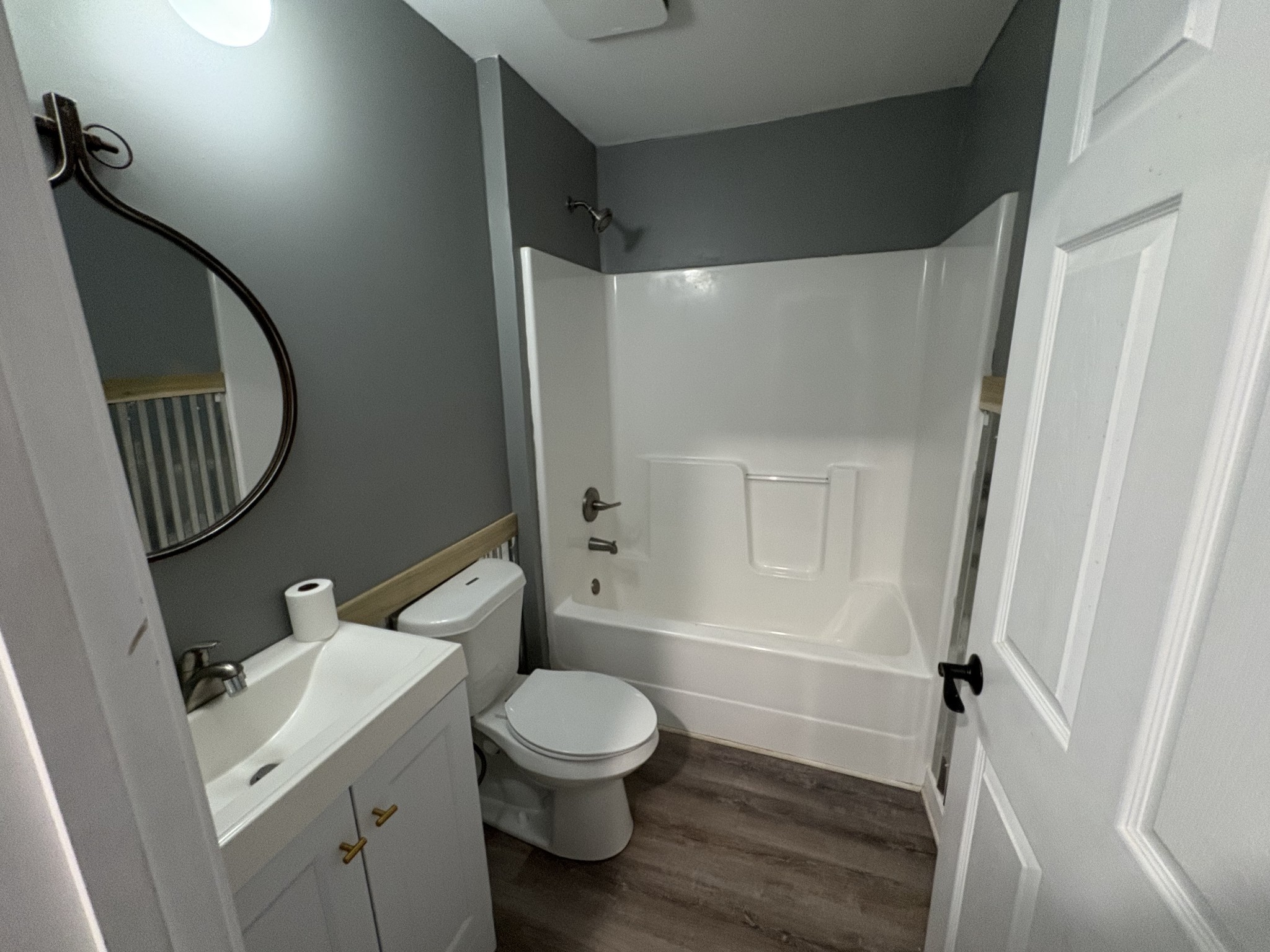 134 Elm Street Pulaski, TN 38478 - Photo 28 of 34 a bathroom with a toilet sink and mirror