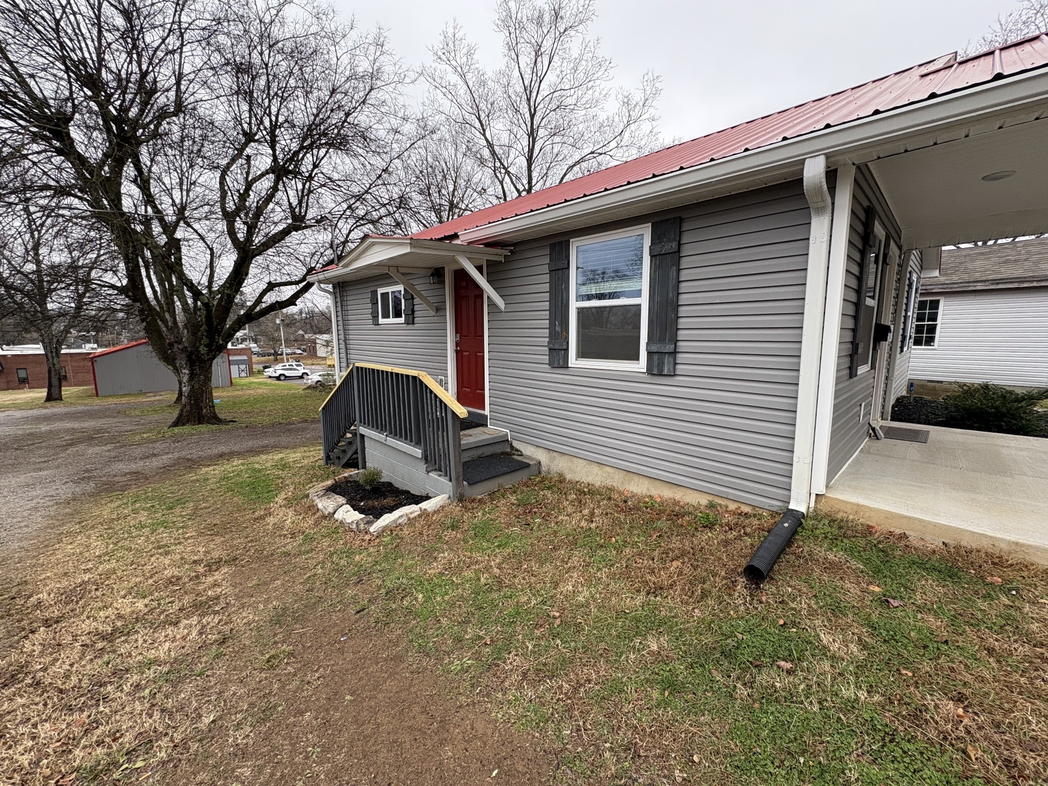 134 Elm Street Pulaski, TN 38478 - Photo 5 of 34 a view of a house with a yard