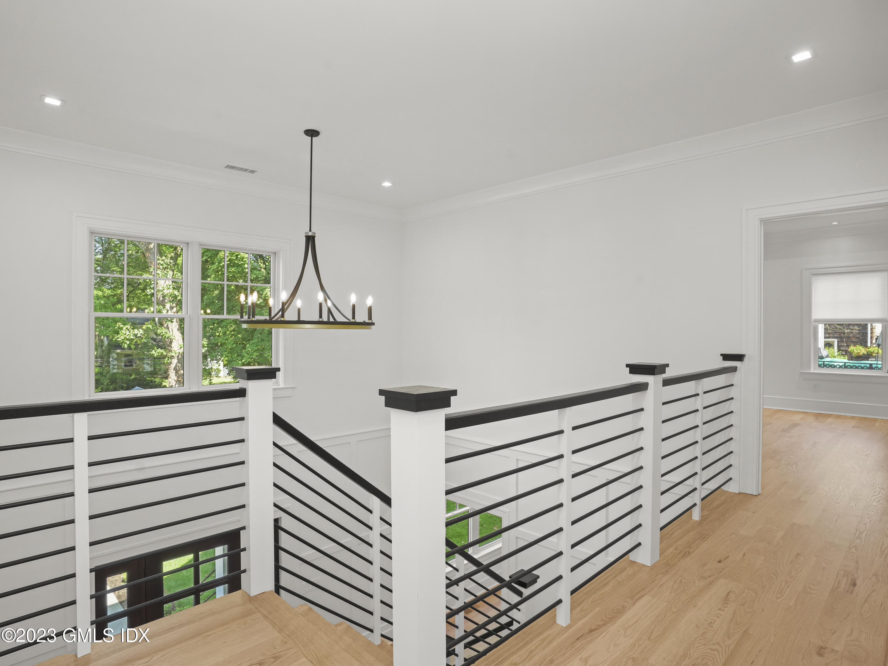 40 Butler Street Cos Cob, CT 06807 - Photo 16 of 27 a view of a room with stairs and windows