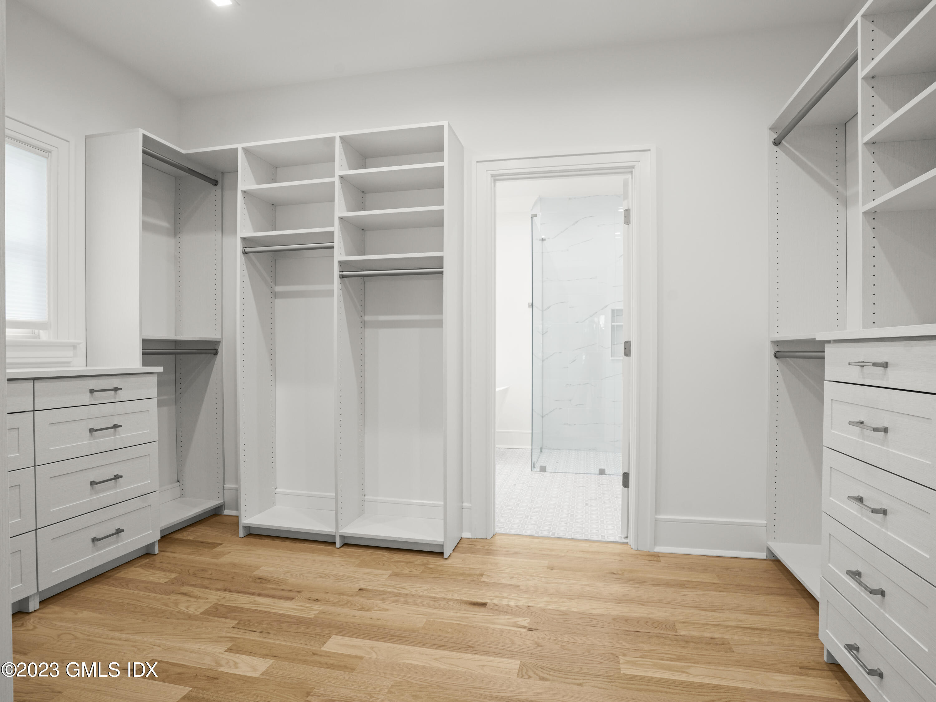 40 Butler Street Cos Cob, CT 06807 - Photo 18 of 27 a view of an empty walk in closet