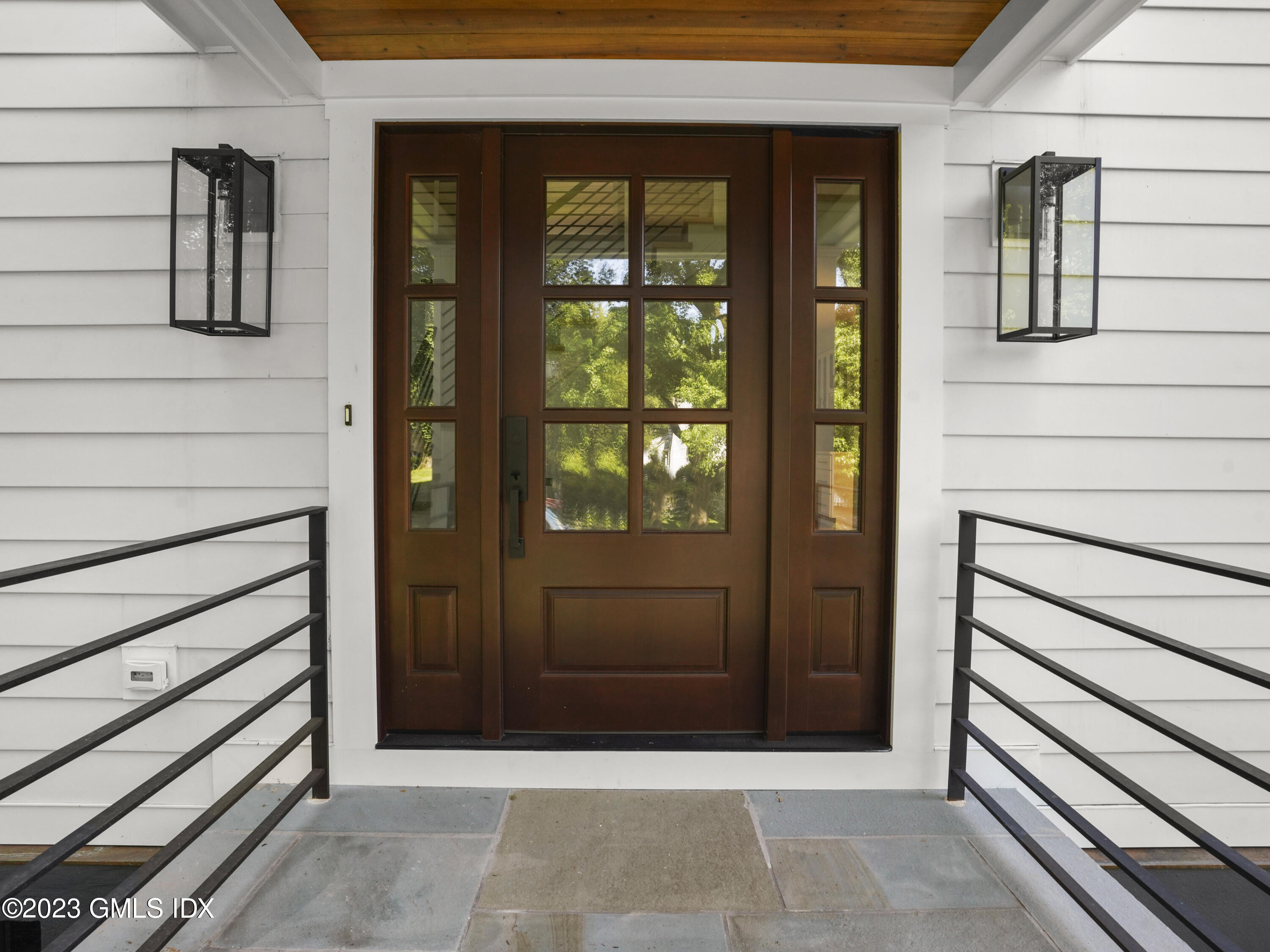40 Butler Street Cos Cob, CT 06807 - Photo 2 of 27 a view of entrance gate of the house