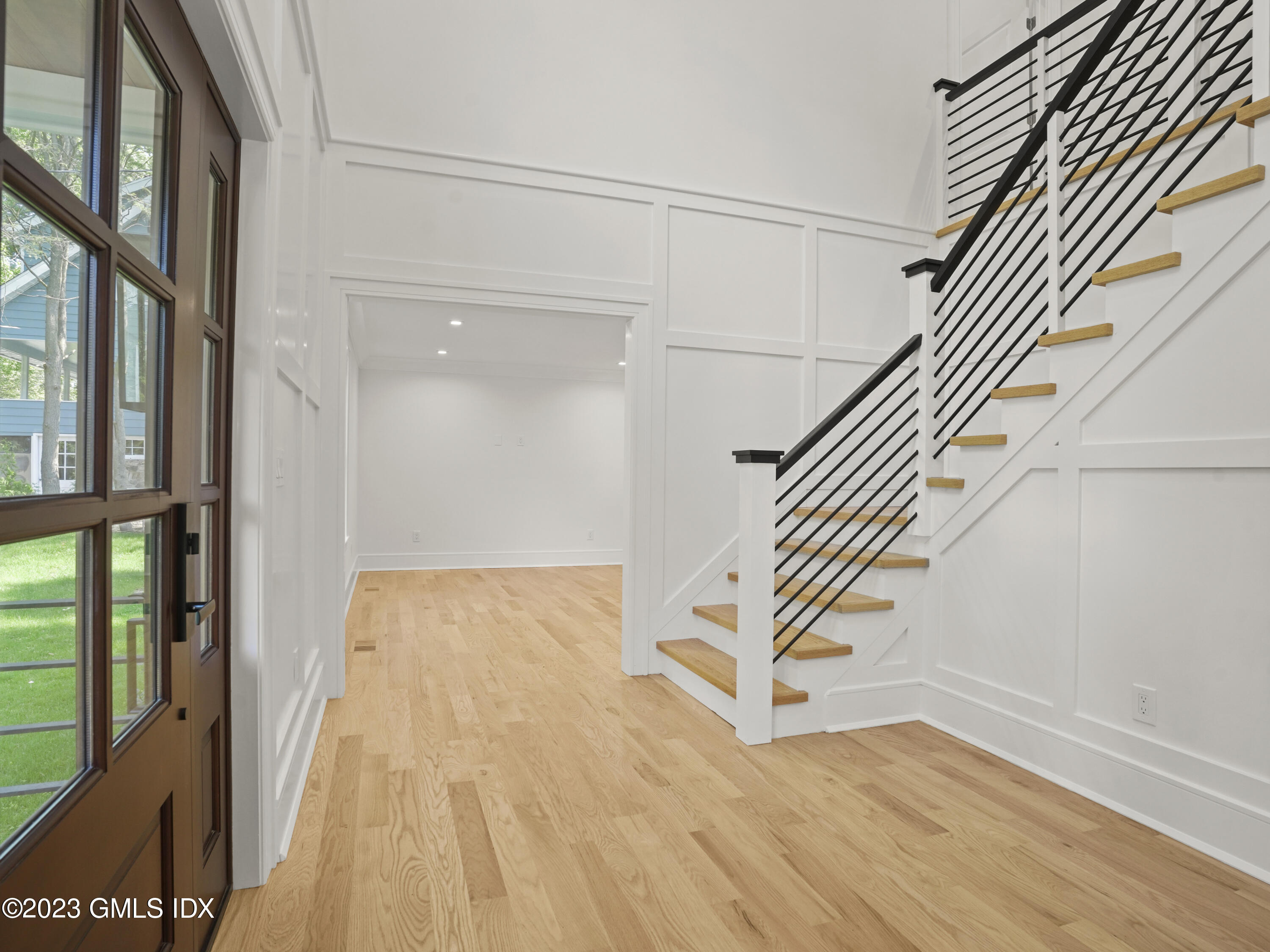 40 Butler Street Cos Cob, CT 06807 - Photo 3 of 27 a view of entryway and hall with wooden floor