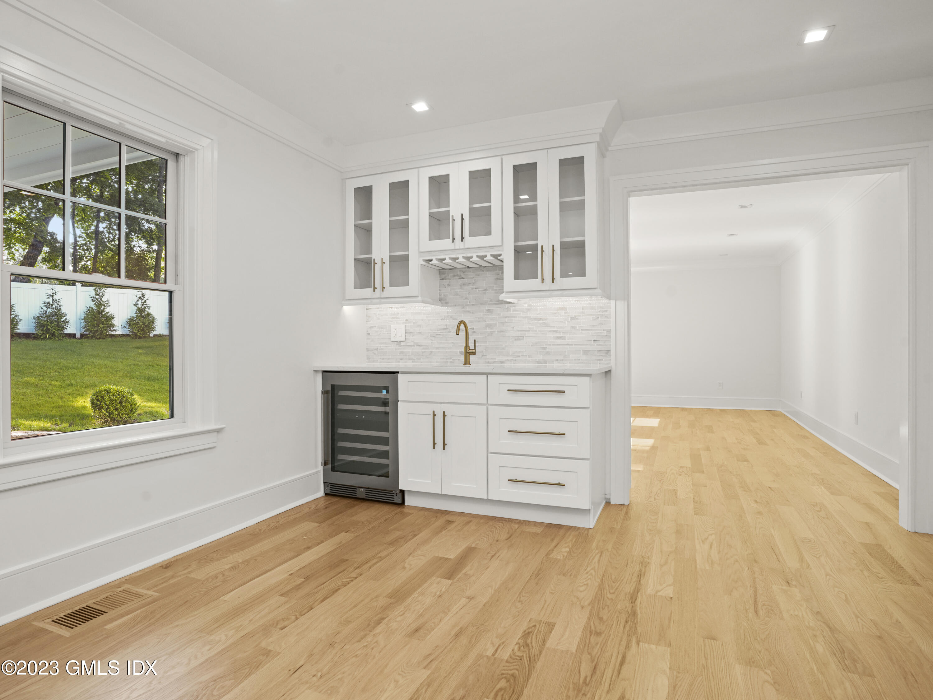 40 Butler Street Cos Cob, CT 06807 - Photo 6 of 27 a view of a bedroom with furniture and windows