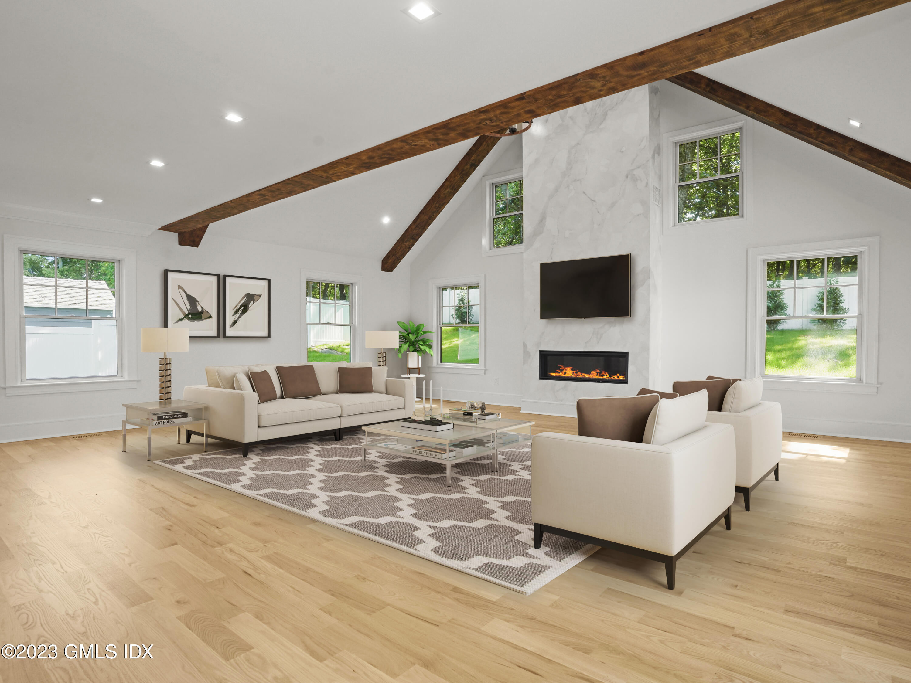 40 Butler Street Cos Cob, CT 06807 - Photo 7 of 27 a living room with fireplace furniture and a flat screen tv