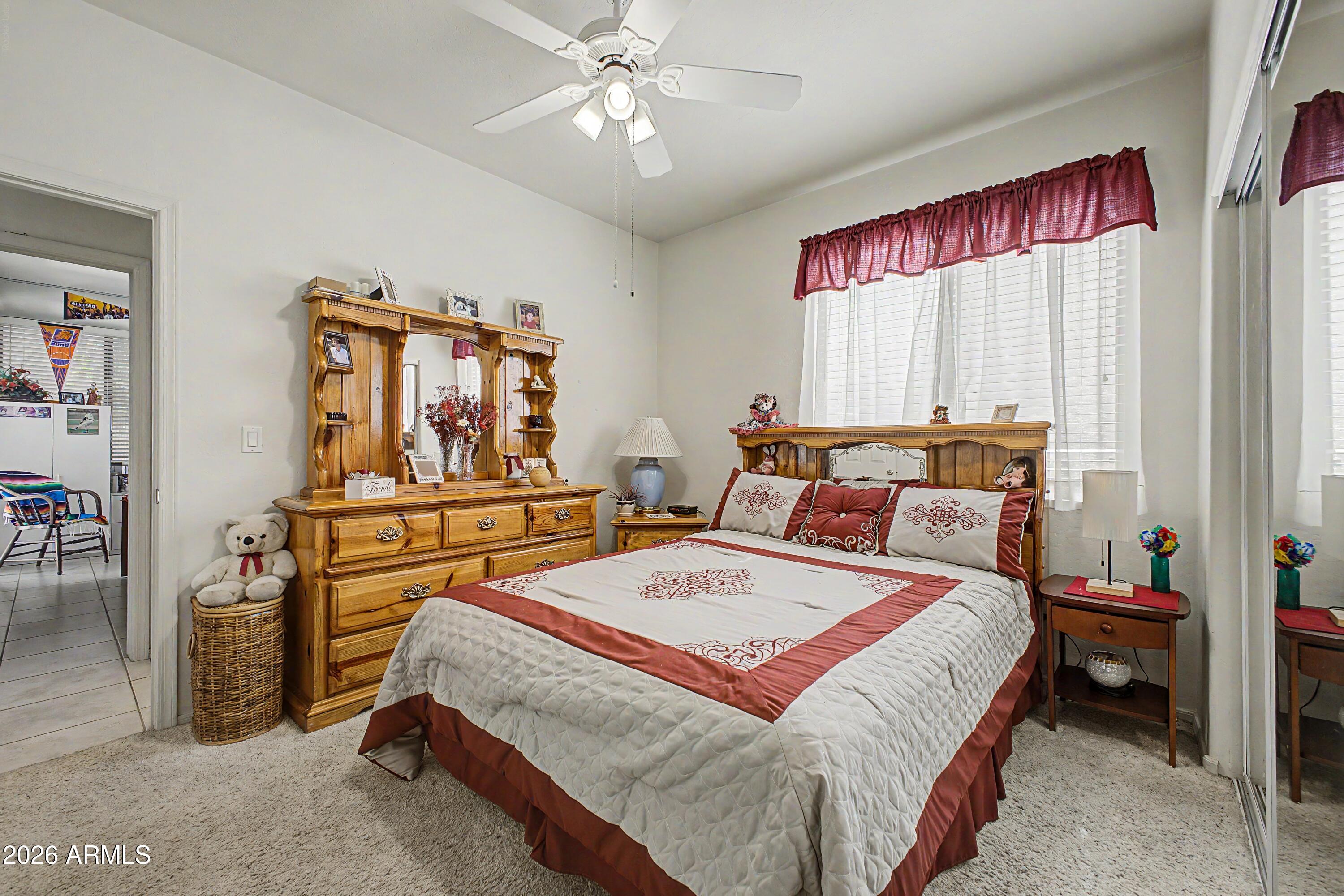 433 West Desert Avenue Gilbert, AZ 85233 - Photo 12 of 23 a bedroom with a bed and a dresser