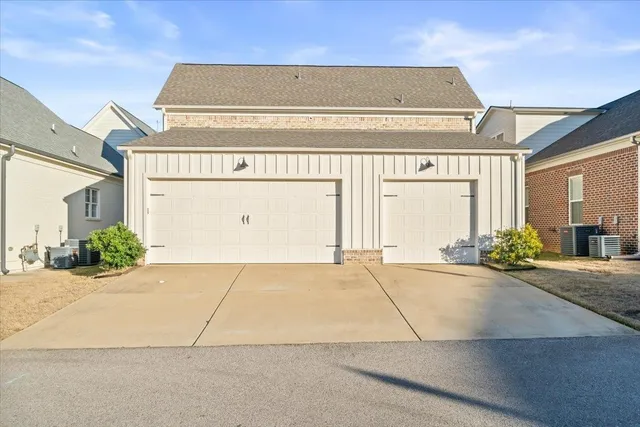 a view of a house with a parking space