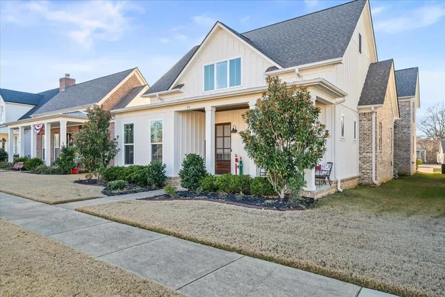 a view of a house with a garden