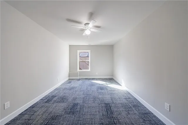 an aerial view of houses with outdoor space