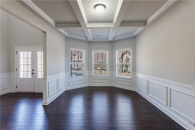 a kitchen with stainless steel appliances and cabinets