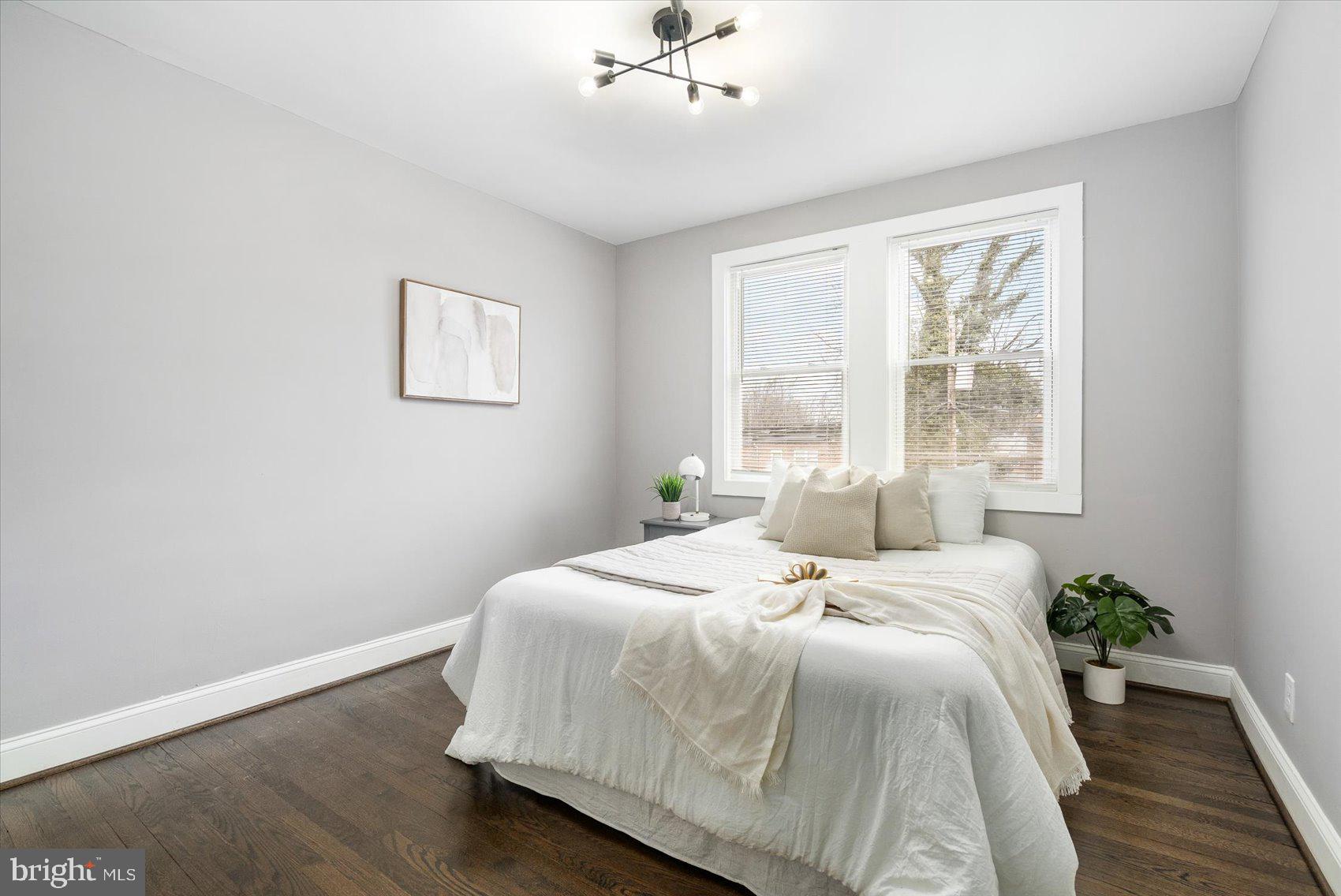 4208 Colborne Road Baltimore, MD 21229 - Photo 23 of 34 a bedroom with a bed and window