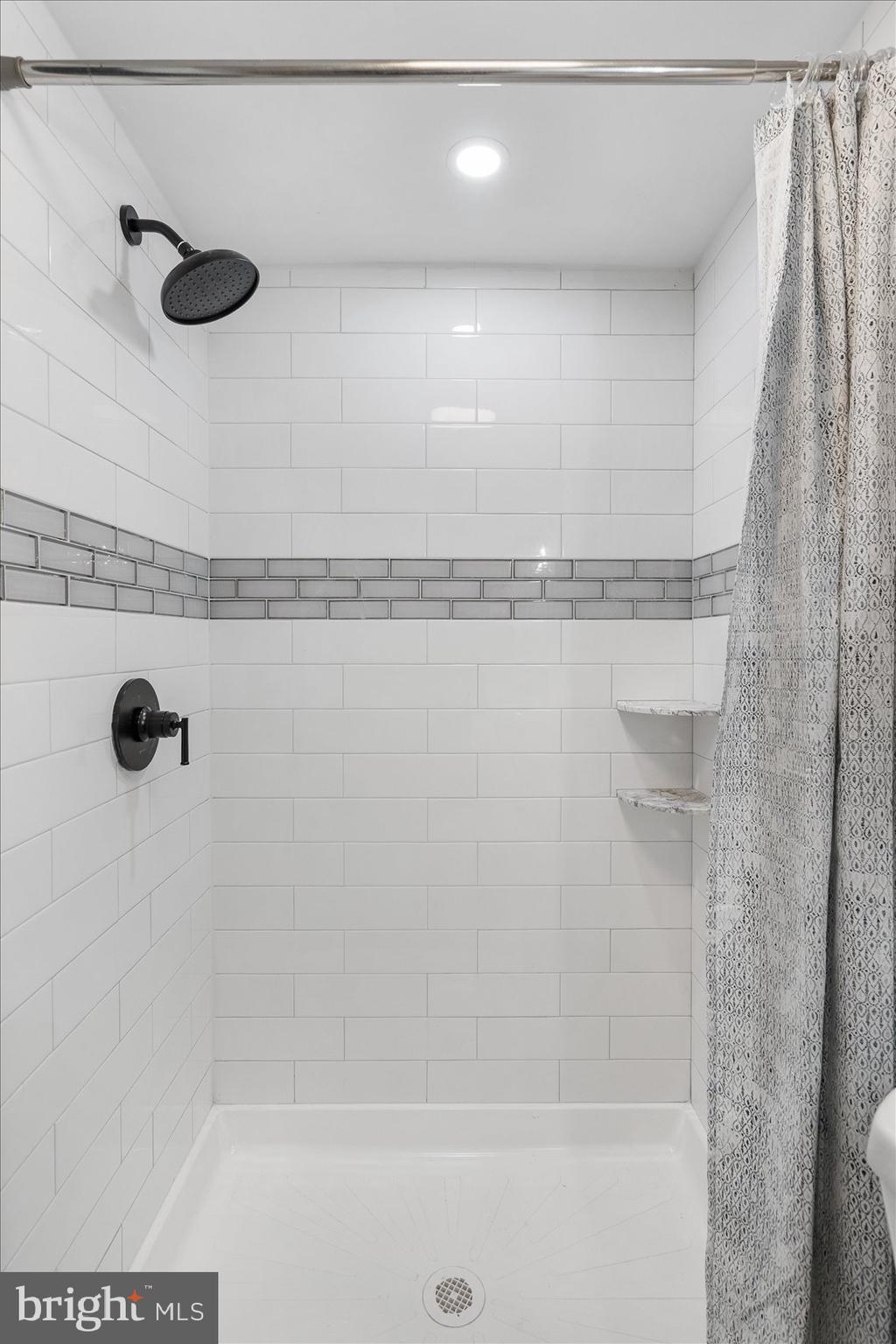 4208 Colborne Road Baltimore, MD 21229 - Photo 32 of 34 a bathroom with a shower