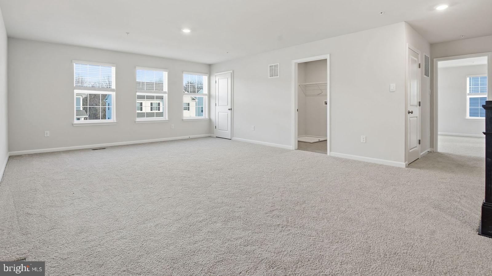 8110 Cypress Pt Drive Rosedale, MD 21237 - Photo 12 of 37 a view of an empty room with windows and closet