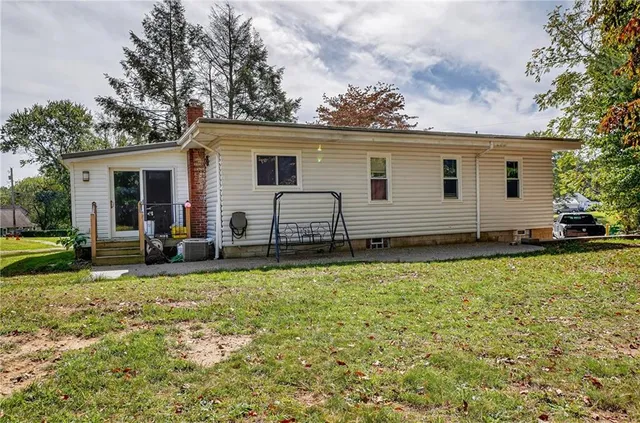 a view of a house with a patio