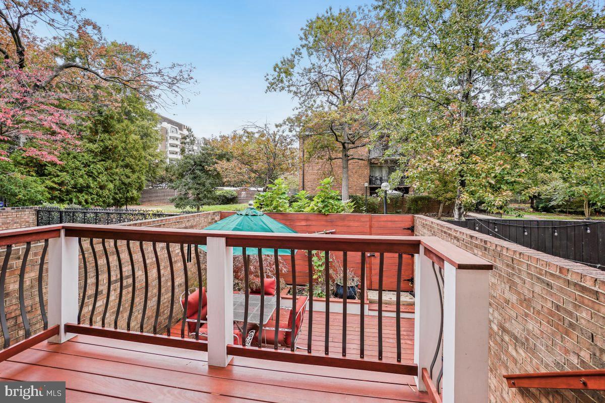 623 I Street Southwest Washington, DC 20024 - Photo 26 of 33 a balcony with wooden floor and fence
