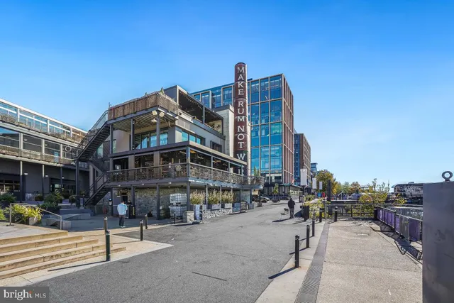 a view of a building with sitting area