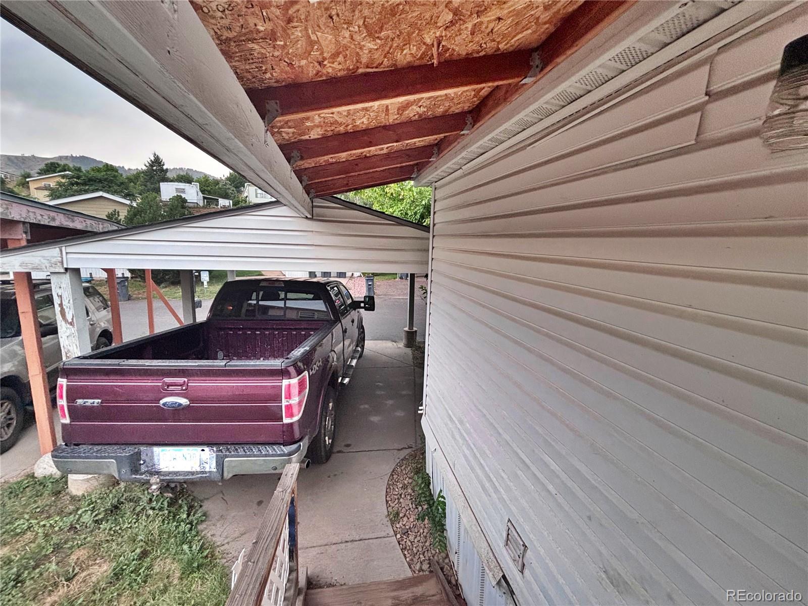 201 Pinto Street Golden, CO 80401 - Photo 20 of 22 a view of a two chairs in the balcony