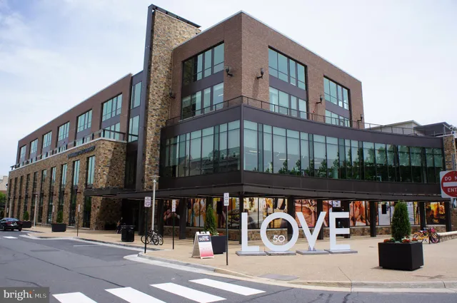 a front view of building with street