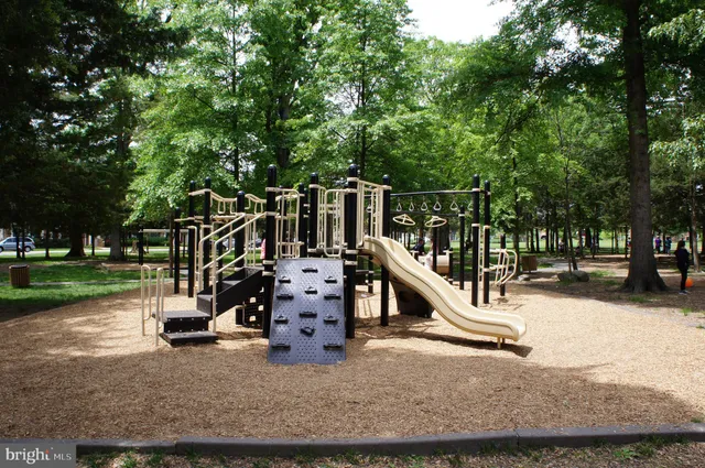 a view of a park with swings