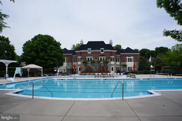 a view of a house with swimming pool