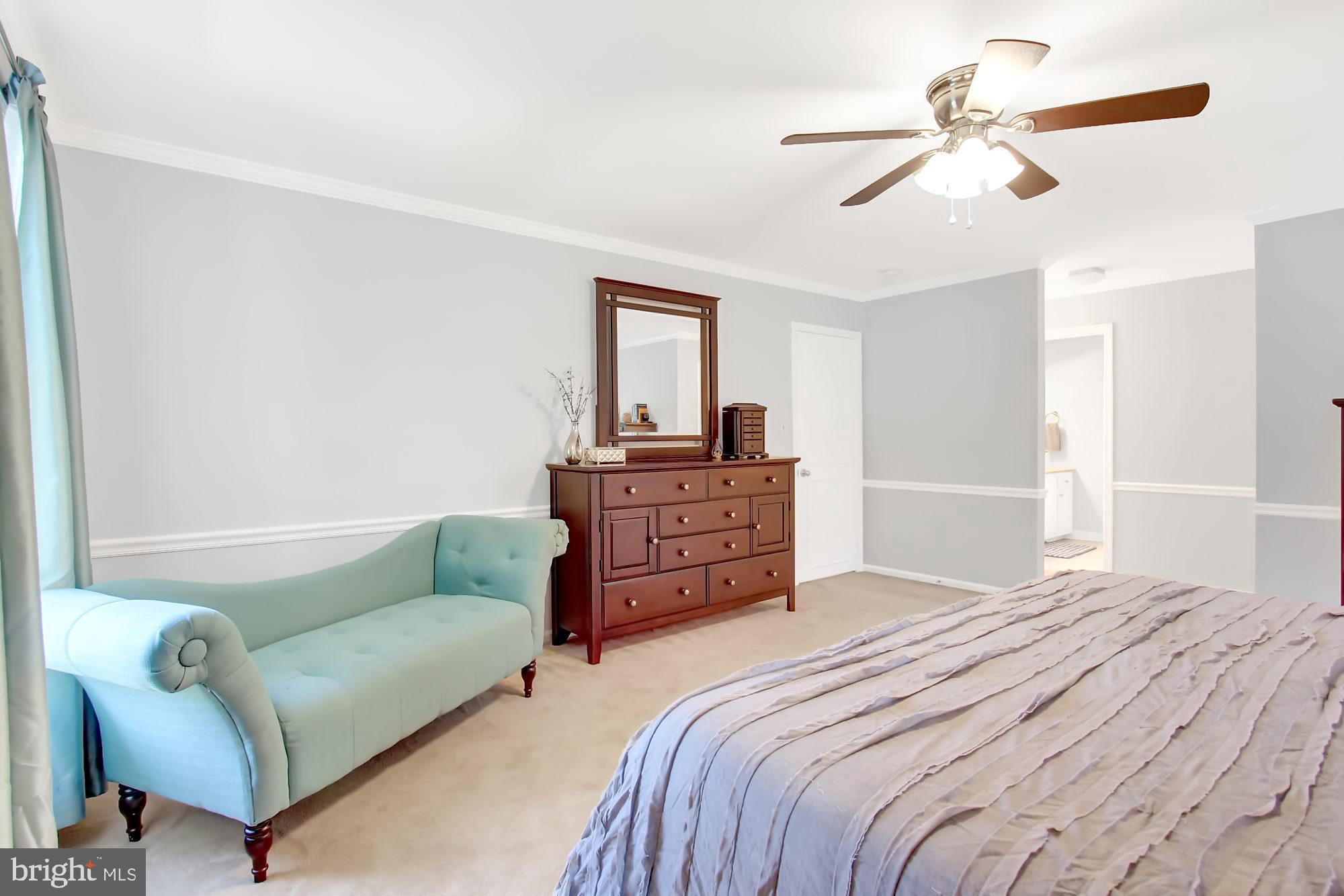 13705 Harcum Road Phoenix, MD 21131 - Photo 23 of 52 Crown molding and chair rail