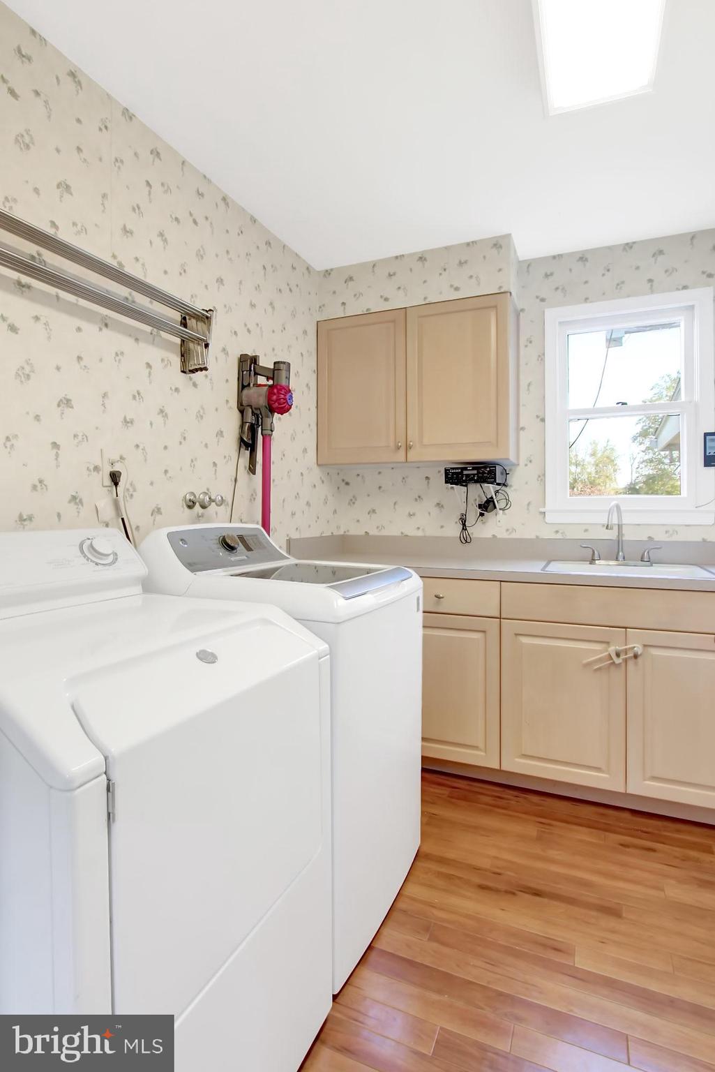 13705 Harcum Road Phoenix, MD 21131 - Photo 36 of 52 Main level laundry room