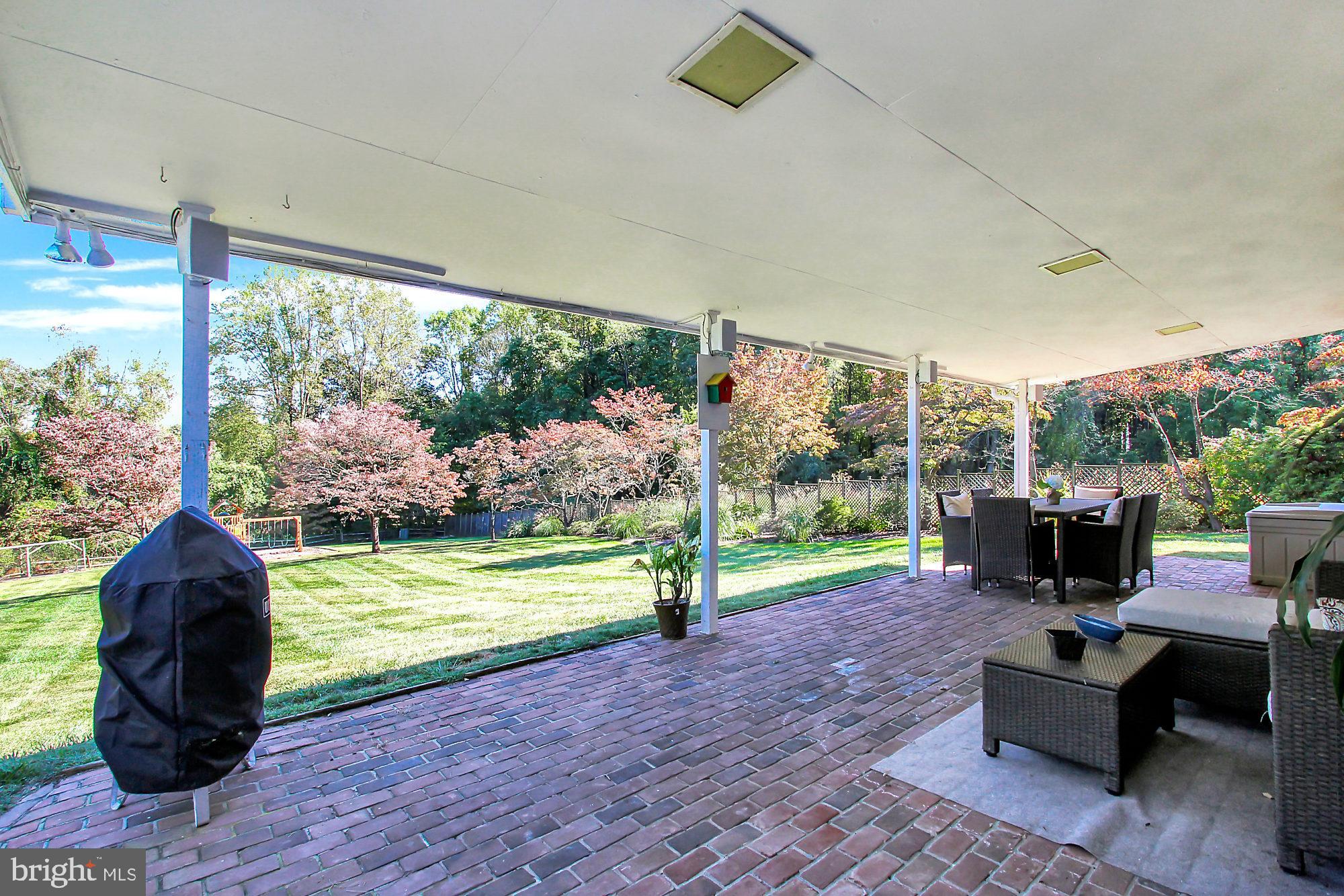 13705 Harcum Road Phoenix, MD 21131 - Photo 40 of 52 Expansive brick patio!