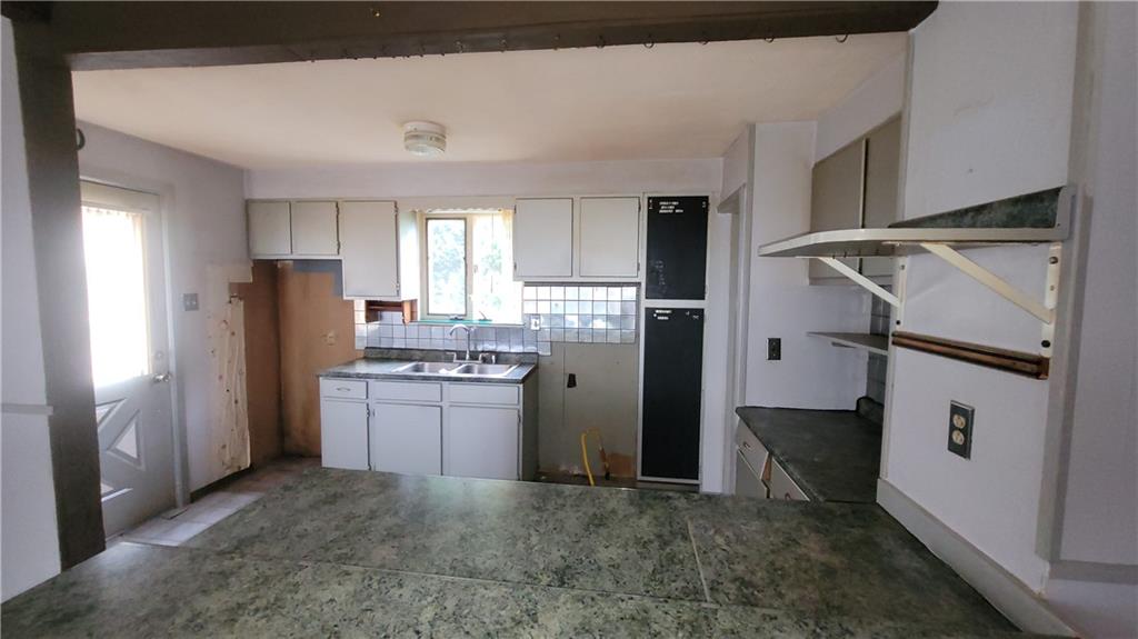 1314 George Street Coraopolis, PA 15108 - Photo 3 of 24 a kitchen with refrigerator and window