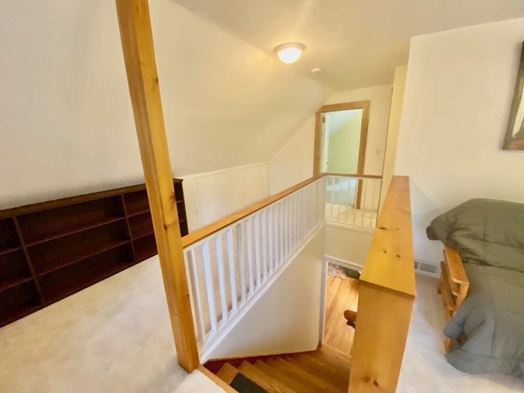 236 Harkness Road Amherst, MA 01002 - Photo 26 of 41 a view of entryway with wooden floor