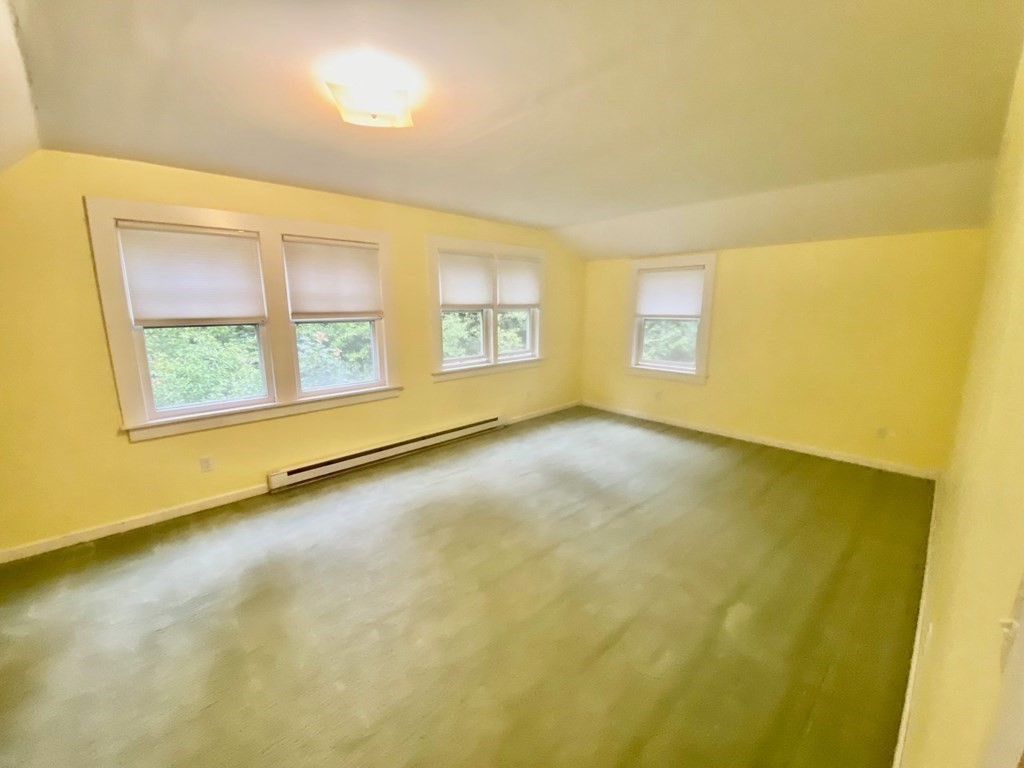 236 Harkness Road Amherst, MA 01002 - Photo 29 of 41 a view of an empty room with a window