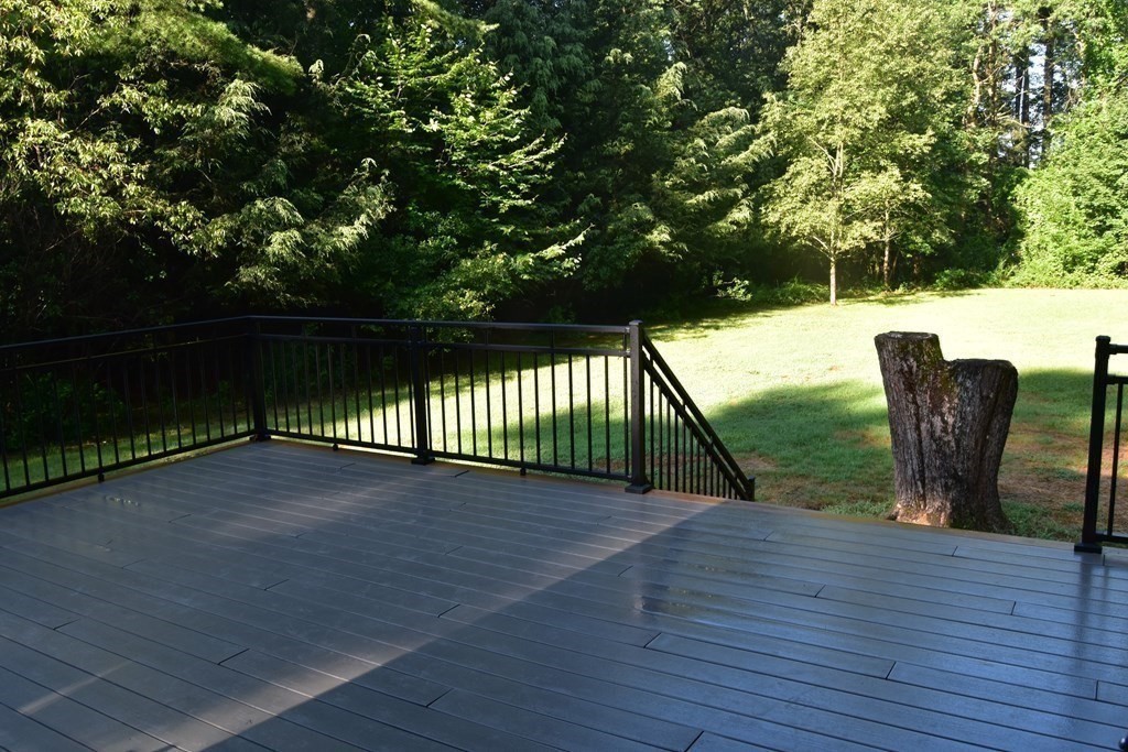 236 Harkness Road Amherst, MA 01002 - Photo 37 of 41 a view of deck with patio and lake view