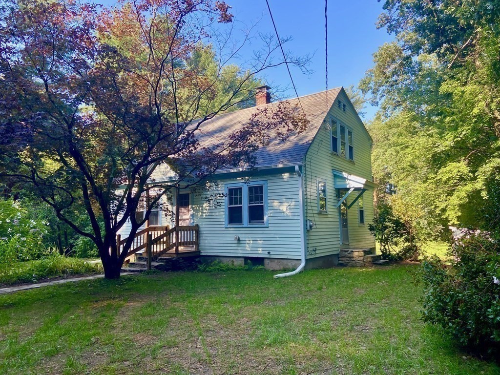 236 Harkness Road Amherst, MA 01002 - Photo 5 of 41 a view of a house with a garden
