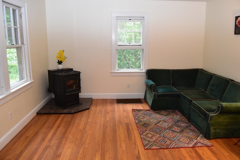 236 Harkness Road Amherst, MA 01002 - Photo 9 of 41 a living room with furniture and a window