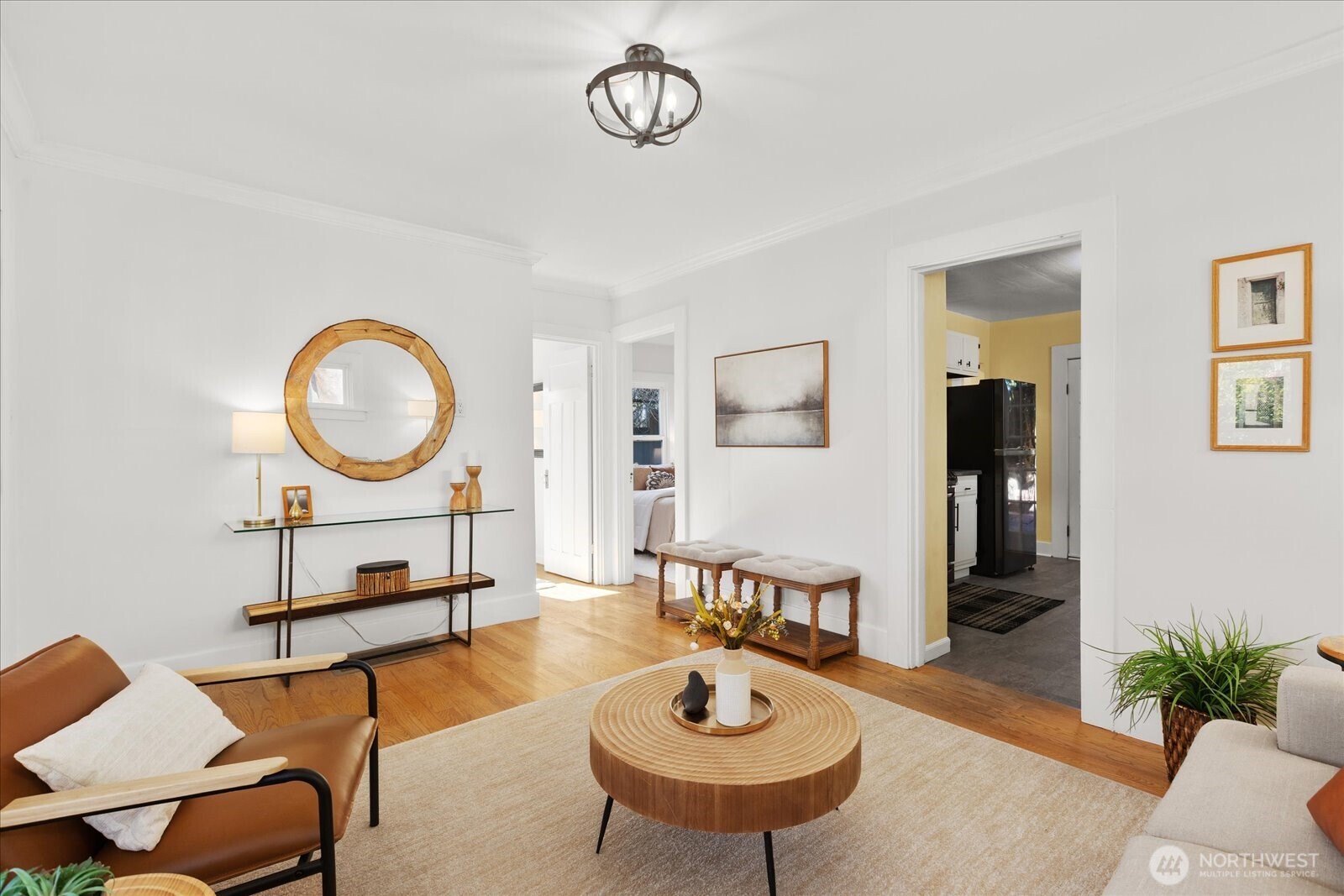 7729 18th Avenue Southwest Seattle, WA 98106 - Photo 14 of 36 a living room with furniture a mirror and a table